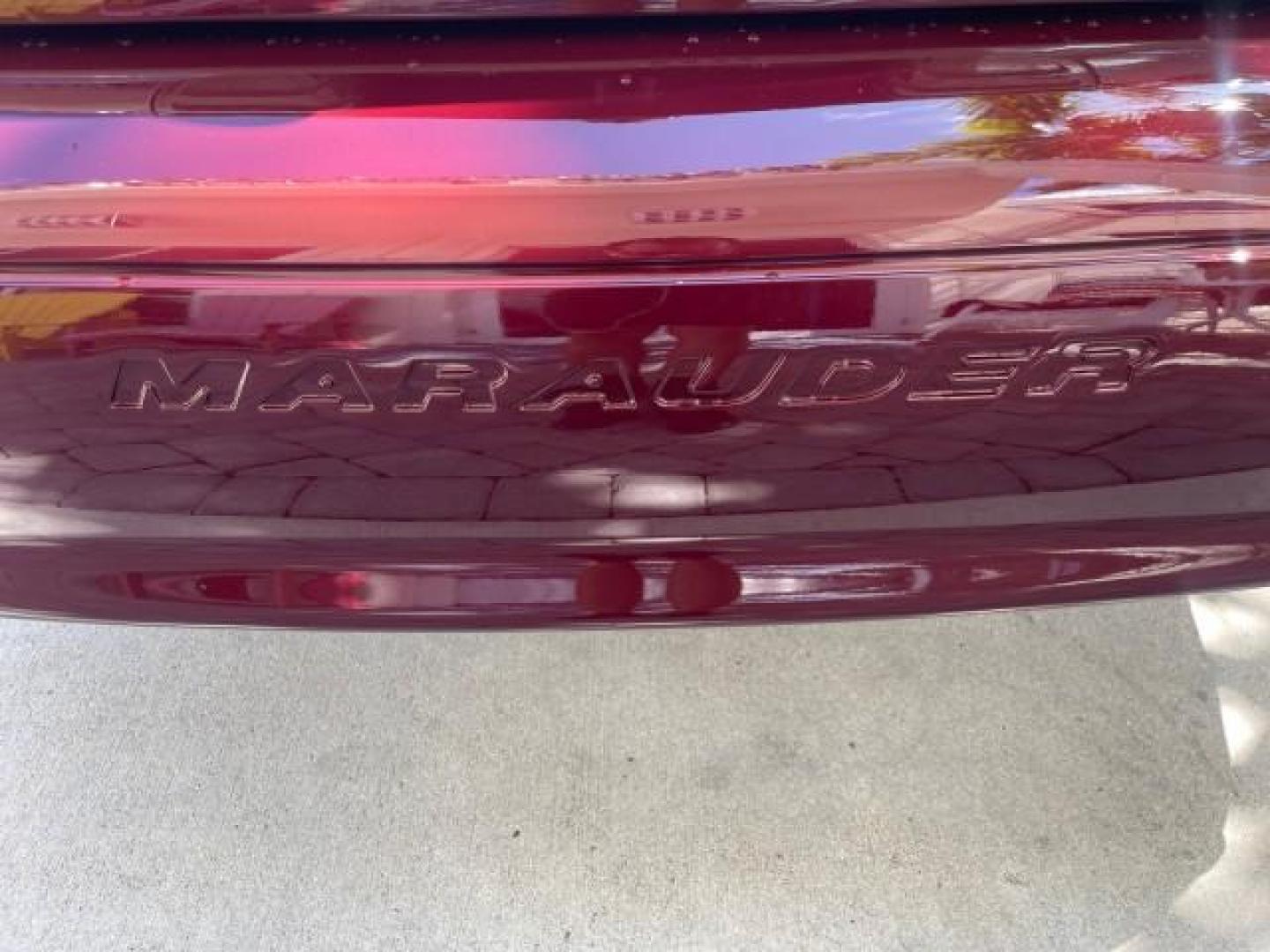2004 Dark Toreador Red Metallic /Light Flint Mercury Marauder COBRA V 8 DUAL OVER HEAD CAM LOW MILES 21,997 (2MEHM79V94X) with an 4.6L DOHC SEFI 32-Valve V8 All-Aluminum Engine engine, Automatic transmission, located at 4701 North Dixie Hwy, Pompano Beach, FL, 33064, (954) 422-2889, 26.240938, -80.123474 - OUR WEBPAGE FLORIDACARS1.COM HAS OVER 100 PHOTOS AND FREE CARFAX LINK 2004 MERCURY MARAUDER VIN: 2MEHM79V94X671770 2 M E H M 7 9 V 9 4 X 6 7 1 7 7 0 SEDAN 4 DR 4.6L V8 F DOHC GASOLINE REAR WHEEL DRIVE Features ABS Brakes Air Conditioning Alloy Wheels AM/FM Stereo Audiophile Sound System Automatic Tr - Photo#83