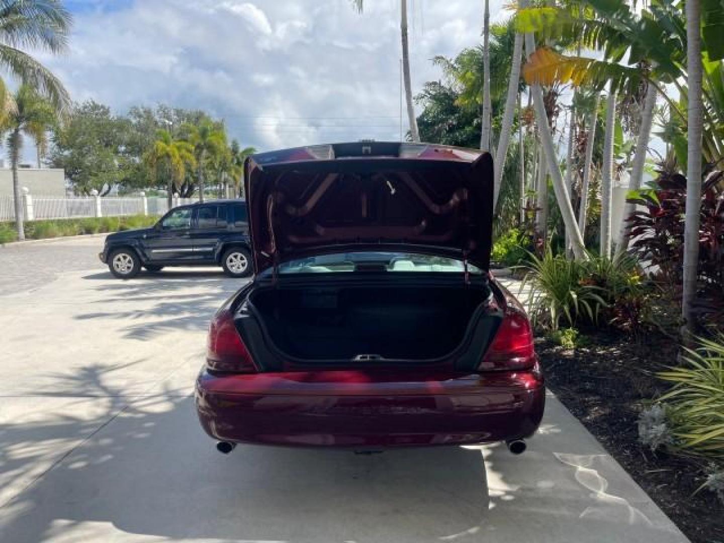 2004 Dark Toreador Red Metallic /Light Flint Mercury Marauder COBRA V 8 DUAL OVER HEAD CAM LOW MILES 21,997 (2MEHM79V94X) with an 4.6L DOHC SEFI 32-Valve V8 All-Aluminum Engine engine, Automatic transmission, located at 4701 North Dixie Hwy, Pompano Beach, FL, 33064, (954) 422-2889, 26.240938, -80.123474 - OUR WEBPAGE FLORIDACARS1.COM HAS OVER 100 PHOTOS AND FREE CARFAX LINK 2004 MERCURY MARAUDER VIN: 2MEHM79V94X671770 2 M E H M 7 9 V 9 4 X 6 7 1 7 7 0 SEDAN 4 DR 4.6L V8 F DOHC GASOLINE REAR WHEEL DRIVE Features ABS Brakes Air Conditioning Alloy Wheels AM/FM Stereo Audiophile Sound System Automatic Tr - Photo#84