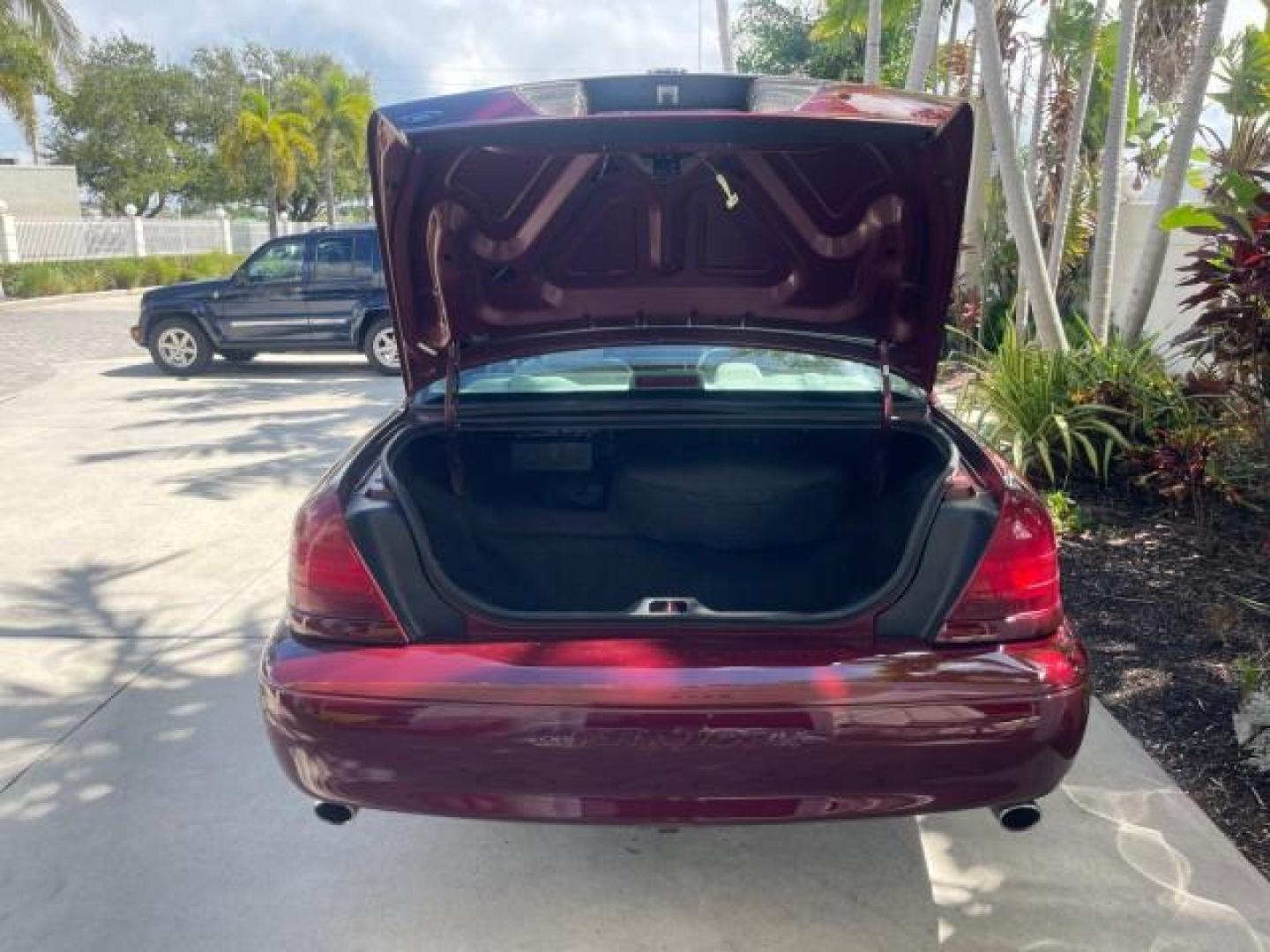 2004 Dark Toreador Red Metallic /Light Flint Mercury Marauder COBRA V 8 DUAL OVER HEAD CAM LOW MILES 21,997 (2MEHM79V94X) with an 4.6L DOHC SEFI 32-Valve V8 All-Aluminum Engine engine, Automatic transmission, located at 4701 North Dixie Hwy, Pompano Beach, FL, 33064, (954) 422-2889, 26.240938, -80.123474 - OUR WEBPAGE FLORIDACARS1.COM HAS OVER 100 PHOTOS AND FREE CARFAX LINK 2004 MERCURY MARAUDER VIN: 2MEHM79V94X671770 2 M E H M 7 9 V 9 4 X 6 7 1 7 7 0 SEDAN 4 DR 4.6L V8 F DOHC GASOLINE REAR WHEEL DRIVE Features ABS Brakes Air Conditioning Alloy Wheels AM/FM Stereo Audiophile Sound System Automatic Tr - Photo#85