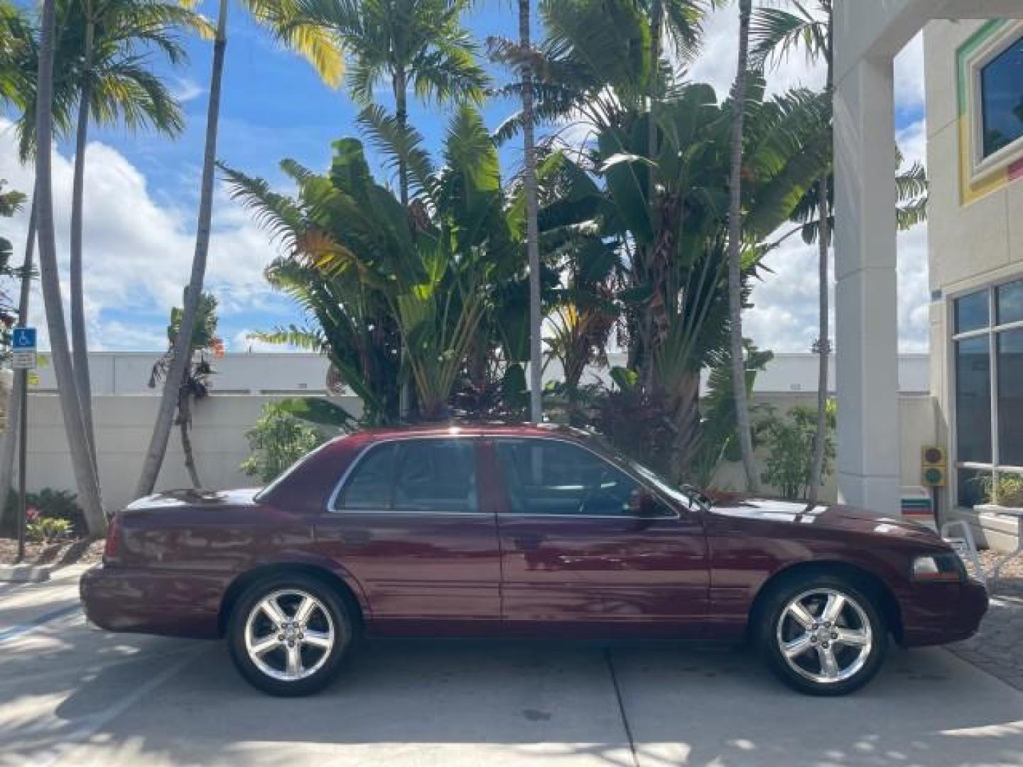 2004 Dark Toreador Red Metallic /Light Flint Mercury Marauder COBRA V 8 DUAL OVER HEAD CAM LOW MILES 21,997 (2MEHM79V94X) with an 4.6L DOHC SEFI 32-Valve V8 All-Aluminum Engine engine, Automatic transmission, located at 4701 North Dixie Hwy, Pompano Beach, FL, 33064, (954) 422-2889, 26.240938, -80.123474 - OUR WEBPAGE FLORIDACARS1.COM HAS OVER 100 PHOTOS AND FREE CARFAX LINK 2004 MERCURY MARAUDER VIN: 2MEHM79V94X671770 2 M E H M 7 9 V 9 4 X 6 7 1 7 7 0 SEDAN 4 DR 4.6L V8 F DOHC GASOLINE REAR WHEEL DRIVE Features ABS Brakes Air Conditioning Alloy Wheels AM/FM Stereo Audiophile Sound System Automatic Tr - Photo#96