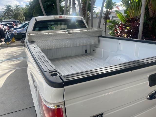 2014 Oxford White /Steel Gray Ford F-150 XL LOW MILES 28,806 4WD (1FTMF1EM2EK) with an 3.7L V6 Cylinder Engine engine, Automatic transmission, located at 4701 North Dixie Hwy, Pompano Beach, FL, 33064, (954) 422-2889, 26.240938, -80.123474 - OUR WEBPAGE FLORIDACARS1.COM HAS OVER 100 PHOTOS AND FREE CARFAX LINK 2014 FORD F-150 XL LONG BED 8 FT VIN: 1FTMF1EM2EKE36278 1 F T M F 1 E M 2 E K E 3 6 2 7 8 PICKUP 3.7L V6 F DOHC 24V FLEX FUEL REAR WHEEL DRIVE W/ 4X4 Features 4WD/AWD ABS Brakes Air Conditioning AM/FM Stereo Automatic Transmission - Photo#78