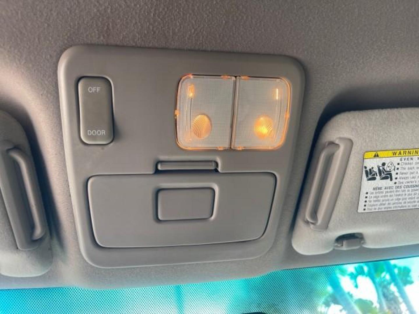 2006 Bluesteel Metallic /Taupe Toyota Tundra SR5 LOW MILES 4.7 V8 (5TBRT34136S) with an 4.7L DOHC SEFI 32-Valve i-Force V8 Engine engine, Automatic transmission, located at 4701 North Dixie Hwy, Pompano Beach, FL, 33064, (954) 422-2889, 26.240938, -80.123474 - OUR WEBPAGE FLORIDACARS1.COM HAS OVER 100 PHOTOS AND FREE CARFAX LINK 2006 TOYOTA TUNDRA SR5 LONG BED VIN: 5TBRT34136S474719 5 T B R T 3 4 1 3 6 S 4 7 4 7 1 9 4 DOOR EXTENDED CAB PICKUP 4.7L V8 F DOHC 32V GASOLINE REAR WHEEL DRIVE Features ABS Brakes Air Conditioning AM/FM Stereo Automatic Transmiss - Photo#69