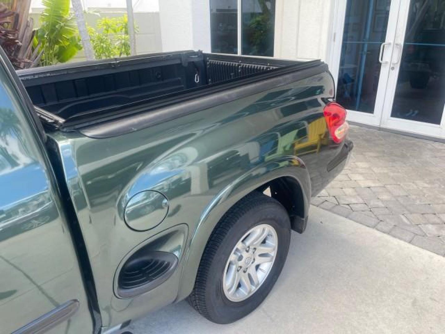 2006 Bluesteel Metallic /Taupe Toyota Tundra SR5 LOW MILES 4.7 V8 (5TBRT34136S) with an 4.7L DOHC SEFI 32-Valve i-Force V8 Engine engine, Automatic transmission, located at 4701 North Dixie Hwy, Pompano Beach, FL, 33064, (954) 422-2889, 26.240938, -80.123474 - OUR WEBPAGE FLORIDACARS1.COM HAS OVER 100 PHOTOS AND FREE CARFAX LINK 2006 TOYOTA TUNDRA SR5 LONG BED VIN: 5TBRT34136S474719 5 T B R T 3 4 1 3 6 S 4 7 4 7 1 9 4 DOOR EXTENDED CAB PICKUP 4.7L V8 F DOHC 32V GASOLINE REAR WHEEL DRIVE Features ABS Brakes Air Conditioning AM/FM Stereo Automatic Transmiss - Photo#90