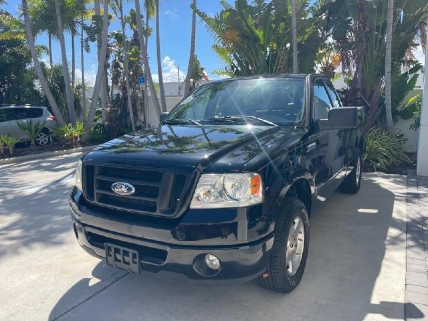 2007 Black /Flint Ford F-150 STX LOW 41,792 1 OWNER (1FTRF12247K) with an 4.2L EFI V6 Engine engine, Automatic transmission, located at 4701 North Dixie Hwy, Pompano Beach, FL, 33064, (954) 422-2889, 26.240938, -80.123474 - OUR WEBPAGE FLORIDACARS1.COM HAS OVER 100 PHOTOS AND FREE CARFAX LINK 2007 FORD F-150 XL LONG BED 8 FT VIN: 1FTRF12247KD38557 1 F T R F 1 2 2 4 7 K D 3 8 5 5 7 PICKUP 4.2L V6 F GASOLINE REAR WHEEL DRIVE Features ABS Brakes Air Conditioning Alloy Wheels AM/FM Stereo Automatic Transmission Auxiliary A - Photo#3