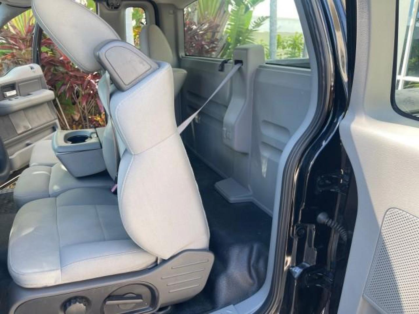 2007 Black /Flint Ford F-150 STX LOW 41,792 1 OWNER (1FTRF12247K) with an 4.2L EFI V6 Engine engine, Automatic transmission, located at 4701 North Dixie Hwy, Pompano Beach, FL, 33064, (954) 422-2889, 26.240938, -80.123474 - OUR WEBPAGE FLORIDACARS1.COM HAS OVER 100 PHOTOS AND FREE CARFAX LINK 2007 FORD F-150 XL LONG BED 8 FT VIN: 1FTRF12247KD38557 1 F T R F 1 2 2 4 7 K D 3 8 5 5 7 PICKUP 4.2L V6 F GASOLINE REAR WHEEL DRIVE Features ABS Brakes Air Conditioning Alloy Wheels AM/FM Stereo Automatic Transmission Auxiliary A - Photo#14
