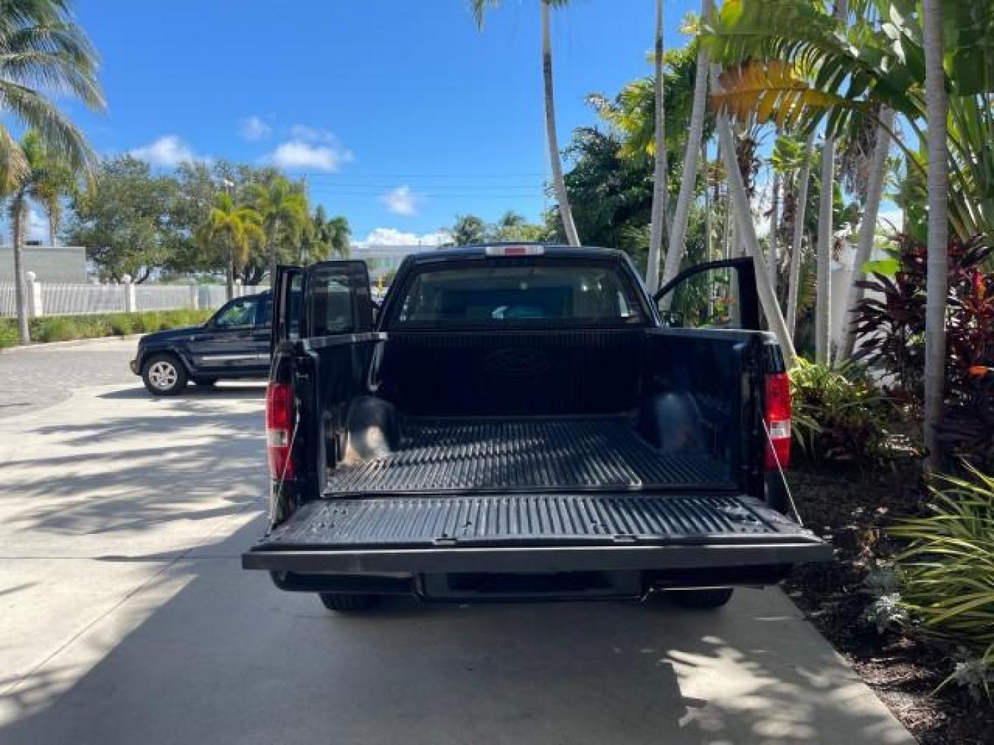 2007 Black /Flint Ford F-150 STX LOW 41,792 1 OWNER (1FTRF12247K) with an 4.2L EFI V6 Engine engine, Automatic transmission, located at 4701 North Dixie Hwy, Pompano Beach, FL, 33064, (954) 422-2889, 26.240938, -80.123474 - OUR WEBPAGE FLORIDACARS1.COM HAS OVER 100 PHOTOS AND FREE CARFAX LINK 2007 FORD F-150 XL LONG BED 8 FT VIN: 1FTRF12247KD38557 1 F T R F 1 2 2 4 7 K D 3 8 5 5 7 PICKUP 4.2L V6 F GASOLINE REAR WHEEL DRIVE Features ABS Brakes Air Conditioning Alloy Wheels AM/FM Stereo Automatic Transmission Auxiliary A - Photo#15