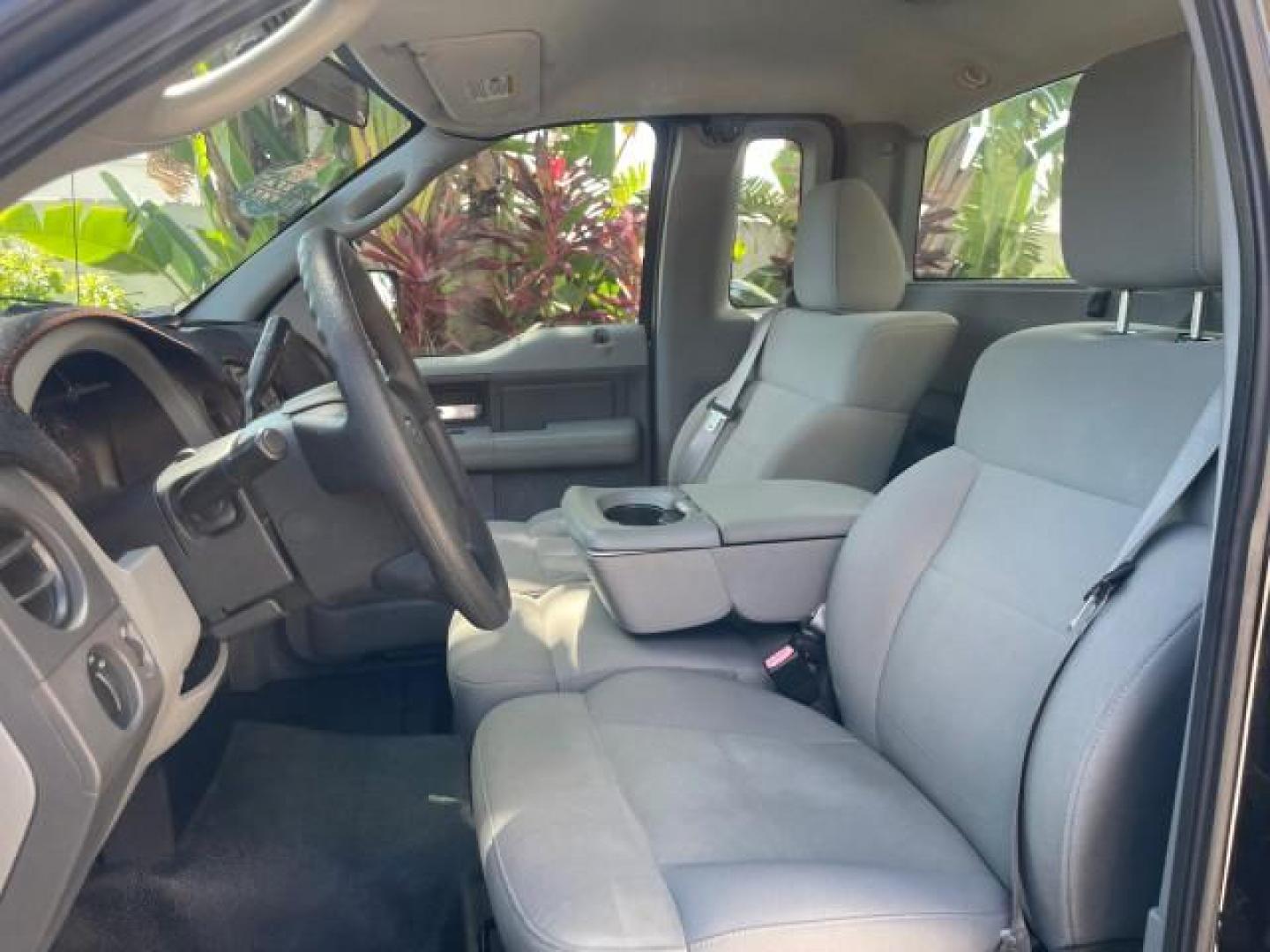 2007 Black /Flint Ford F-150 STX LOW 41,792 1 OWNER (1FTRF12247K) with an 4.2L EFI V6 Engine engine, Automatic transmission, located at 4701 North Dixie Hwy, Pompano Beach, FL, 33064, (954) 422-2889, 26.240938, -80.123474 - OUR WEBPAGE FLORIDACARS1.COM HAS OVER 100 PHOTOS AND FREE CARFAX LINK 2007 FORD F-150 XL LONG BED 8 FT VIN: 1FTRF12247KD38557 1 F T R F 1 2 2 4 7 K D 3 8 5 5 7 PICKUP 4.2L V6 F GASOLINE REAR WHEEL DRIVE Features ABS Brakes Air Conditioning Alloy Wheels AM/FM Stereo Automatic Transmission Auxiliary A - Photo#43
