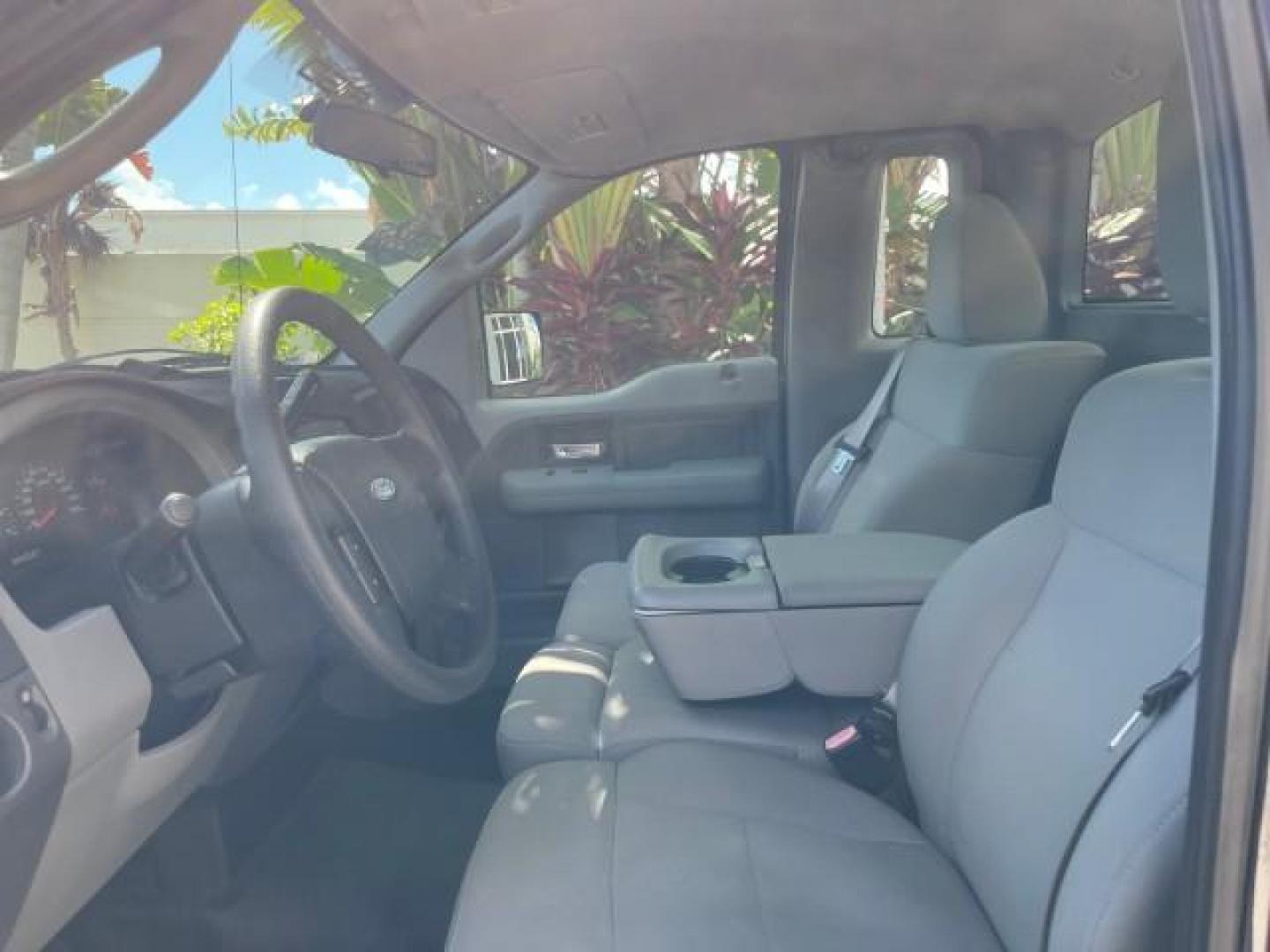 2007 Black /Flint Ford F-150 STX LOW 41,792 1 OWNER (1FTRF12247K) with an 4.2L EFI V6 Engine engine, Automatic transmission, located at 4701 North Dixie Hwy, Pompano Beach, FL, 33064, (954) 422-2889, 26.240938, -80.123474 - OUR WEBPAGE FLORIDACARS1.COM HAS OVER 100 PHOTOS AND FREE CARFAX LINK 2007 FORD F-150 XL LONG BED 8 FT VIN: 1FTRF12247KD38557 1 F T R F 1 2 2 4 7 K D 3 8 5 5 7 PICKUP 4.2L V6 F GASOLINE REAR WHEEL DRIVE Features ABS Brakes Air Conditioning Alloy Wheels AM/FM Stereo Automatic Transmission Auxiliary A - Photo#46