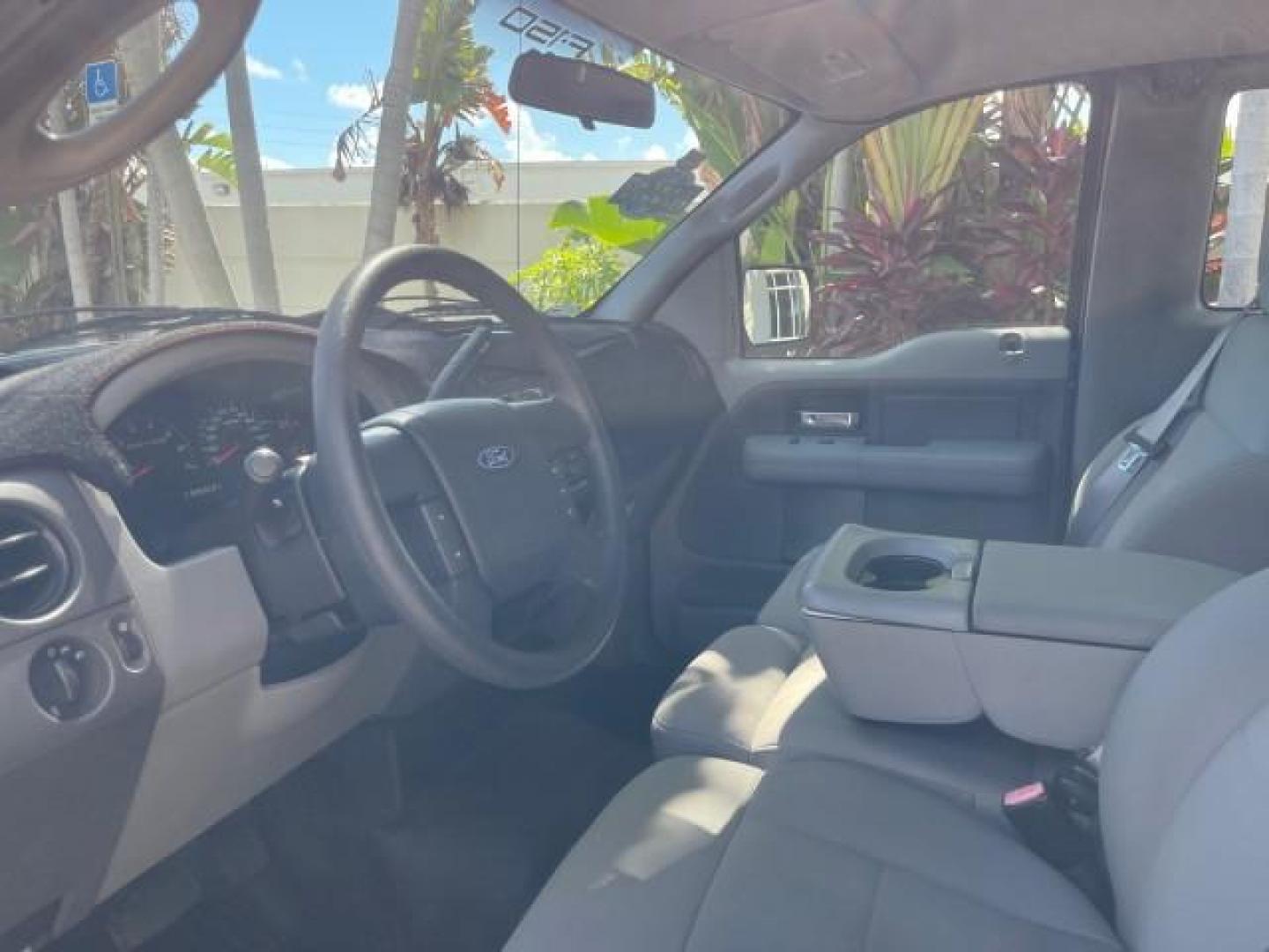 2007 Black /Flint Ford F-150 STX LOW 41,792 1 OWNER (1FTRF12247K) with an 4.2L EFI V6 Engine engine, Automatic transmission, located at 4701 North Dixie Hwy, Pompano Beach, FL, 33064, (954) 422-2889, 26.240938, -80.123474 - OUR WEBPAGE FLORIDACARS1.COM HAS OVER 100 PHOTOS AND FREE CARFAX LINK 2007 FORD F-150 XL LONG BED 8 FT VIN: 1FTRF12247KD38557 1 F T R F 1 2 2 4 7 K D 3 8 5 5 7 PICKUP 4.2L V6 F GASOLINE REAR WHEEL DRIVE Features ABS Brakes Air Conditioning Alloy Wheels AM/FM Stereo Automatic Transmission Auxiliary A - Photo#47
