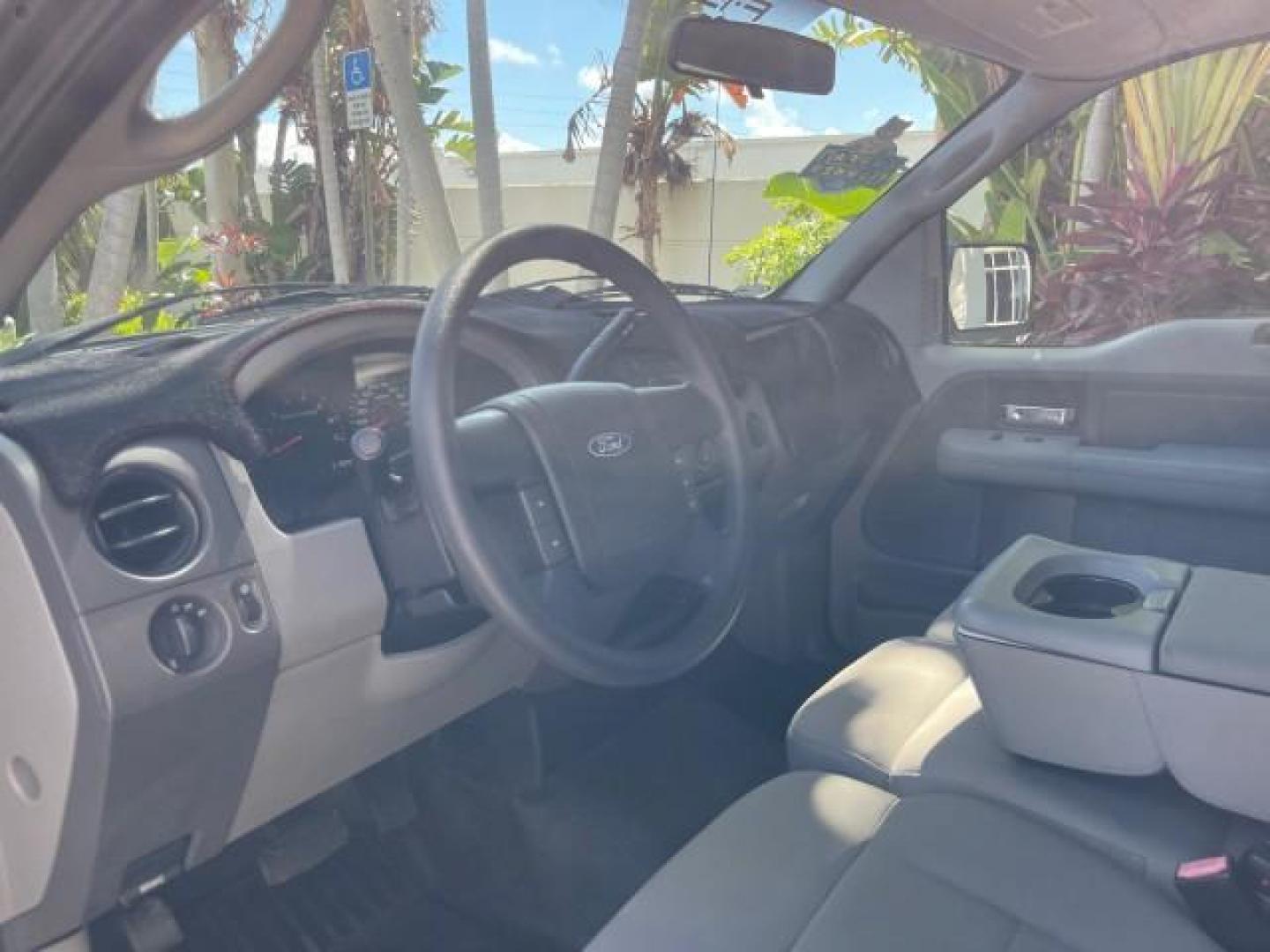 2007 Black /Flint Ford F-150 STX LOW 41,792 1 OWNER (1FTRF12247K) with an 4.2L EFI V6 Engine engine, Automatic transmission, located at 4701 North Dixie Hwy, Pompano Beach, FL, 33064, (954) 422-2889, 26.240938, -80.123474 - OUR WEBPAGE FLORIDACARS1.COM HAS OVER 100 PHOTOS AND FREE CARFAX LINK 2007 FORD F-150 XL LONG BED 8 FT VIN: 1FTRF12247KD38557 1 F T R F 1 2 2 4 7 K D 3 8 5 5 7 PICKUP 4.2L V6 F GASOLINE REAR WHEEL DRIVE Features ABS Brakes Air Conditioning Alloy Wheels AM/FM Stereo Automatic Transmission Auxiliary A - Photo#48