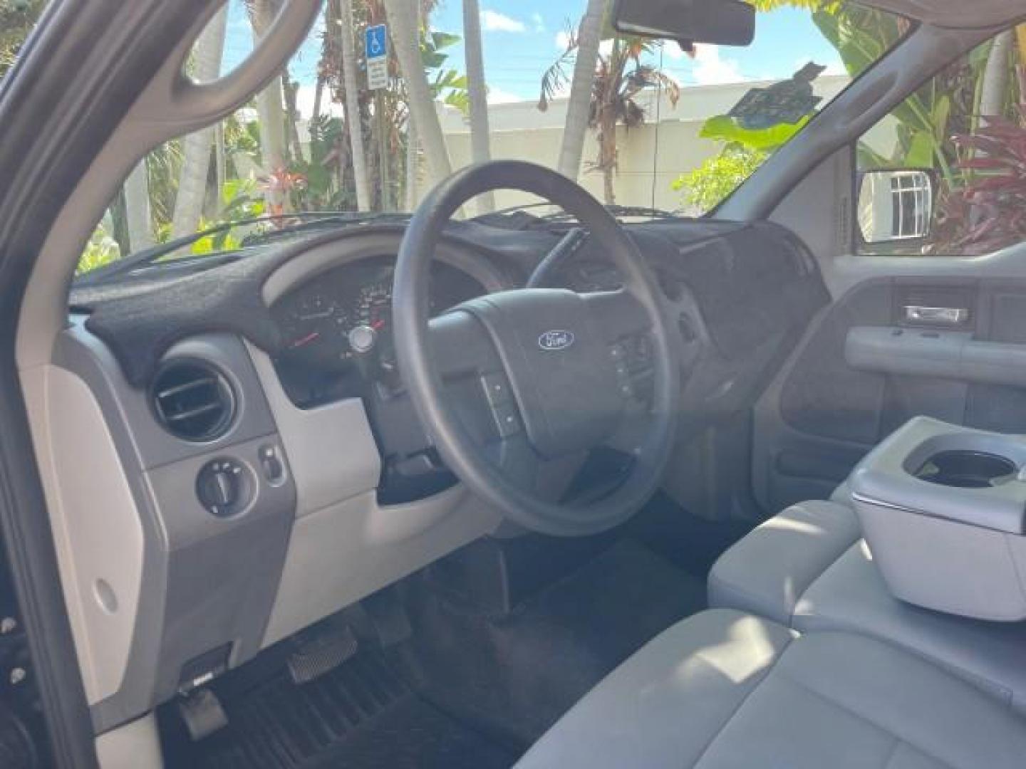 2007 Black /Flint Ford F-150 STX LOW 41,792 1 OWNER (1FTRF12247K) with an 4.2L EFI V6 Engine engine, Automatic transmission, located at 4701 North Dixie Hwy, Pompano Beach, FL, 33064, (954) 422-2889, 26.240938, -80.123474 - OUR WEBPAGE FLORIDACARS1.COM HAS OVER 100 PHOTOS AND FREE CARFAX LINK 2007 FORD F-150 XL LONG BED 8 FT VIN: 1FTRF12247KD38557 1 F T R F 1 2 2 4 7 K D 3 8 5 5 7 PICKUP 4.2L V6 F GASOLINE REAR WHEEL DRIVE Features ABS Brakes Air Conditioning Alloy Wheels AM/FM Stereo Automatic Transmission Auxiliary A - Photo#49