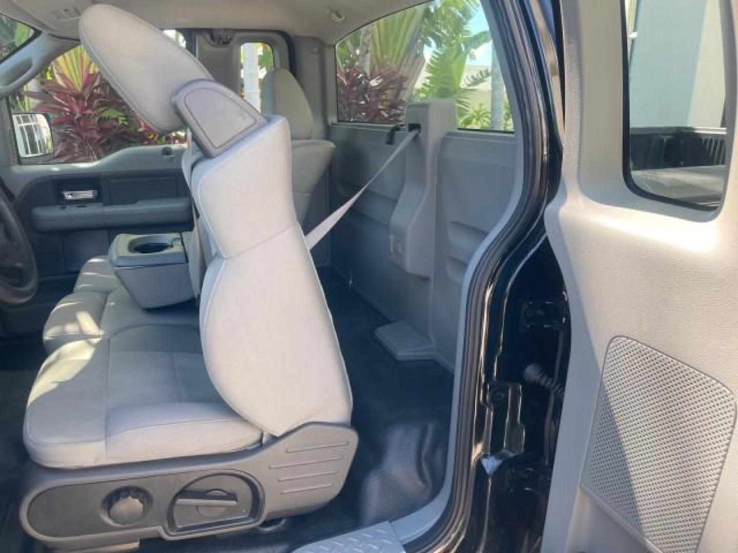 2007 Black /Flint Ford F-150 STX LOW 41,792 1 OWNER (1FTRF12247K) with an 4.2L EFI V6 Engine engine, Automatic transmission, located at 4701 North Dixie Hwy, Pompano Beach, FL, 33064, (954) 422-2889, 26.240938, -80.123474 - OUR WEBPAGE FLORIDACARS1.COM HAS OVER 100 PHOTOS AND FREE CARFAX LINK 2007 FORD F-150 XL LONG BED 8 FT VIN: 1FTRF12247KD38557 1 F T R F 1 2 2 4 7 K D 3 8 5 5 7 PICKUP 4.2L V6 F GASOLINE REAR WHEEL DRIVE Features ABS Brakes Air Conditioning Alloy Wheels AM/FM Stereo Automatic Transmission Auxiliary A - Photo#73