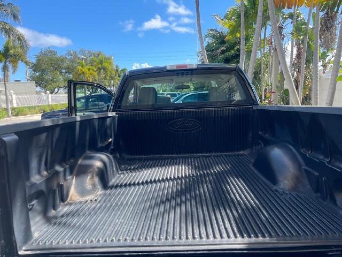 2007 Black /Flint Ford F-150 STX LOW 41,792 1 OWNER (1FTRF12247K) with an 4.2L EFI V6 Engine engine, Automatic transmission, located at 4701 North Dixie Hwy, Pompano Beach, FL, 33064, (954) 422-2889, 26.240938, -80.123474 - OUR WEBPAGE FLORIDACARS1.COM HAS OVER 100 PHOTOS AND FREE CARFAX LINK 2007 FORD F-150 XL LONG BED 8 FT VIN: 1FTRF12247KD38557 1 F T R F 1 2 2 4 7 K D 3 8 5 5 7 PICKUP 4.2L V6 F GASOLINE REAR WHEEL DRIVE Features ABS Brakes Air Conditioning Alloy Wheels AM/FM Stereo Automatic Transmission Auxiliary A - Photo#89