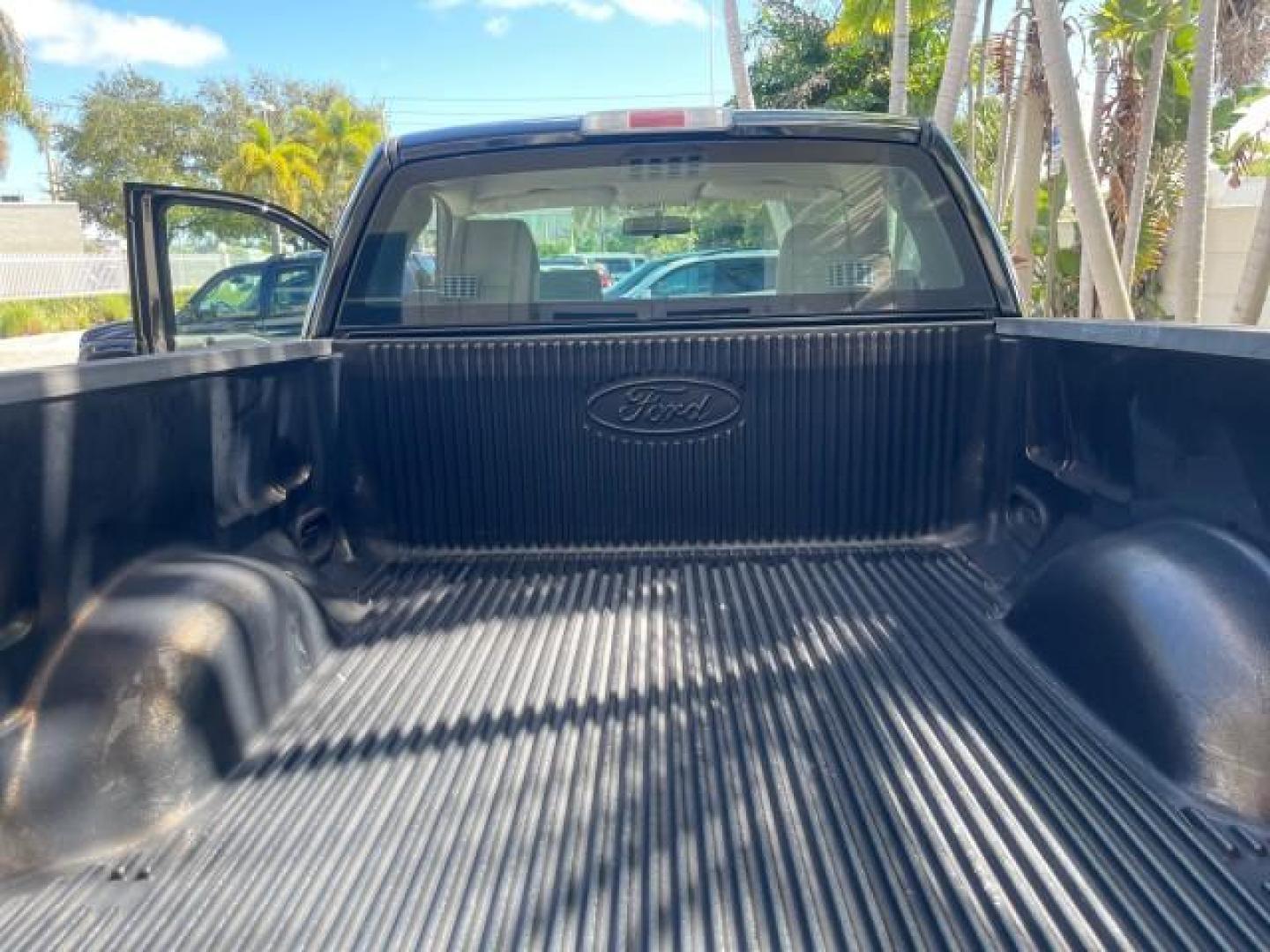 2007 Black /Flint Ford F-150 STX LOW 41,792 1 OWNER (1FTRF12247K) with an 4.2L EFI V6 Engine engine, Automatic transmission, located at 4701 North Dixie Hwy, Pompano Beach, FL, 33064, (954) 422-2889, 26.240938, -80.123474 - OUR WEBPAGE FLORIDACARS1.COM HAS OVER 100 PHOTOS AND FREE CARFAX LINK 2007 FORD F-150 XL LONG BED 8 FT VIN: 1FTRF12247KD38557 1 F T R F 1 2 2 4 7 K D 3 8 5 5 7 PICKUP 4.2L V6 F GASOLINE REAR WHEEL DRIVE Features ABS Brakes Air Conditioning Alloy Wheels AM/FM Stereo Automatic Transmission Auxiliary A - Photo#90