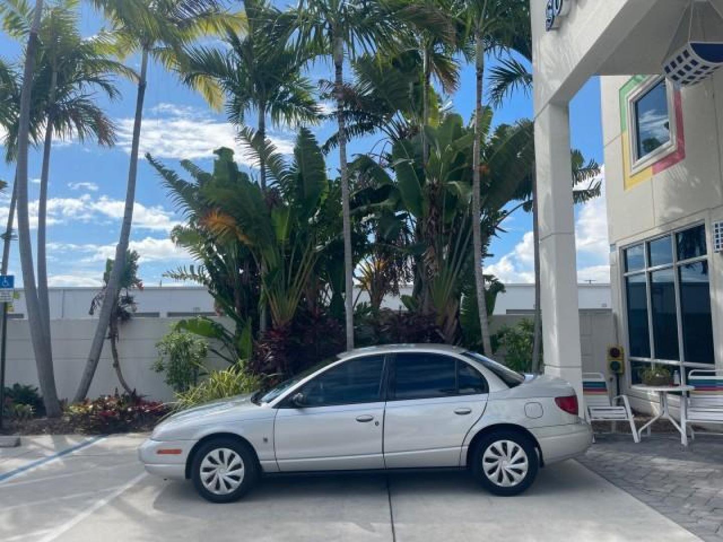 2002 Light Silver /Grey Saturn SL2 LOW MILES 51,437 1 OWNER FLORIDA (1G8ZK54782Z) with an 1.9L DOHC SPFI 16-Valve L4 Aluminum Engine engine, Automatic transmission, located at 4701 North Dixie Hwy, Pompano Beach, FL, 33064, (954) 422-2889, 26.240938, -80.123474 - OUR WEBPAGE FLORIDACARS1.COM HAS OVER 100 PHOTOS AND FREE CARFAX LINK 2002 SATURN S-SERIES SL2 VIN: 1G8ZK54782Z312050 1 G 8 Z K 5 4 7 8 2 Z 3 1 2 0 5 0 SEDAN 4 DR 1.9L I4 F DOHC 16V GASOLINE FRONT WHEEL DRIVE Features Air Conditioning AM/FM Stereo Automatic Transmission Cloth Seats Rear Defroster Pr - Photo#4