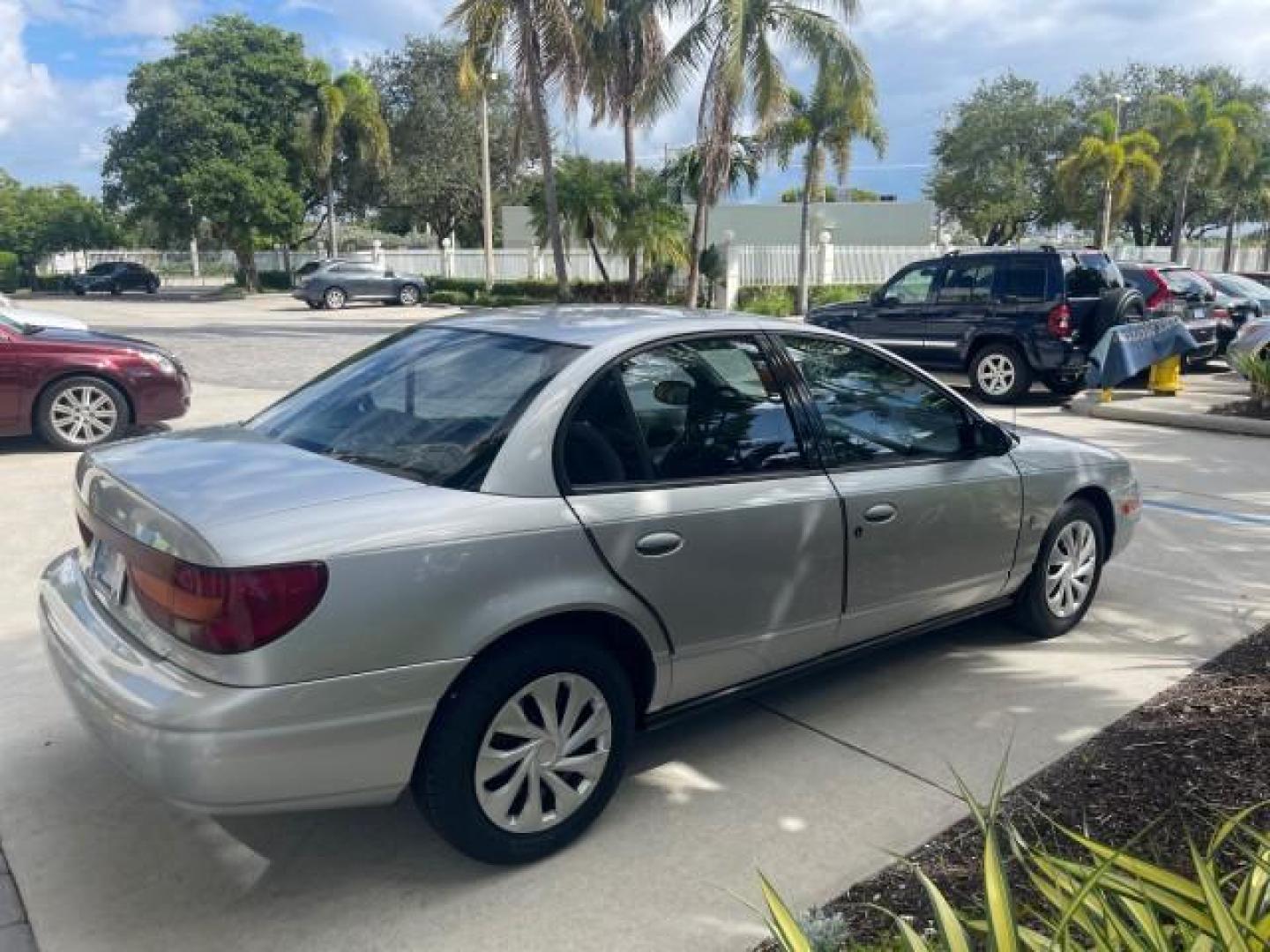 2002 Light Silver /Grey Saturn SL2 LOW MILES 51,437 1 OWNER FLORIDA (1G8ZK54782Z) with an 1.9L DOHC SPFI 16-Valve L4 Aluminum Engine engine, Automatic transmission, located at 4701 North Dixie Hwy, Pompano Beach, FL, 33064, (954) 422-2889, 26.240938, -80.123474 - OUR WEBPAGE FLORIDACARS1.COM HAS OVER 100 PHOTOS AND FREE CARFAX LINK 2002 SATURN S-SERIES SL2 VIN: 1G8ZK54782Z312050 1 G 8 Z K 5 4 7 8 2 Z 3 1 2 0 5 0 SEDAN 4 DR 1.9L I4 F DOHC 16V GASOLINE FRONT WHEEL DRIVE Features Air Conditioning AM/FM Stereo Automatic Transmission Cloth Seats Rear Defroster Pr - Photo#7