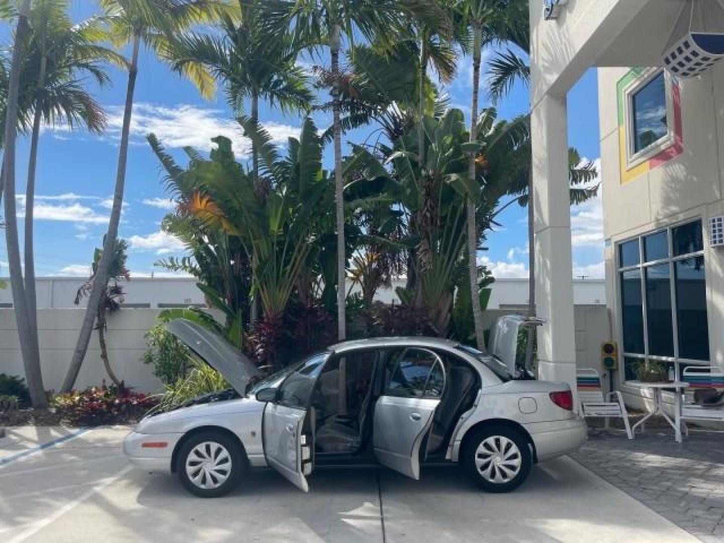2002 Light Silver /Grey Saturn SL2 LOW MILES 51,437 1 OWNER FLORIDA (1G8ZK54782Z) with an 1.9L DOHC SPFI 16-Valve L4 Aluminum Engine engine, Automatic transmission, located at 4701 North Dixie Hwy, Pompano Beach, FL, 33064, (954) 422-2889, 26.240938, -80.123474 - OUR WEBPAGE FLORIDACARS1.COM HAS OVER 100 PHOTOS AND FREE CARFAX LINK 2002 SATURN S-SERIES SL2 VIN: 1G8ZK54782Z312050 1 G 8 Z K 5 4 7 8 2 Z 3 1 2 0 5 0 SEDAN 4 DR 1.9L I4 F DOHC 16V GASOLINE FRONT WHEEL DRIVE Features Air Conditioning AM/FM Stereo Automatic Transmission Cloth Seats Rear Defroster Pr - Photo#8