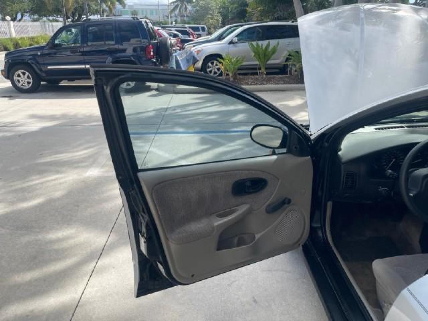 2002 Light Silver /Grey Saturn SL2 LOW MILES 51,437 1 OWNER FLORIDA (1G8ZK54782Z) with an 1.9L DOHC SPFI 16-Valve L4 Aluminum Engine engine, Automatic transmission, located at 4701 North Dixie Hwy, Pompano Beach, FL, 33064, (954) 422-2889, 26.240938, -80.123474 - OUR WEBPAGE FLORIDACARS1.COM HAS OVER 100 PHOTOS AND FREE CARFAX LINK 2002 SATURN S-SERIES SL2 VIN: 1G8ZK54782Z312050 1 G 8 Z K 5 4 7 8 2 Z 3 1 2 0 5 0 SEDAN 4 DR 1.9L I4 F DOHC 16V GASOLINE FRONT WHEEL DRIVE Features Air Conditioning AM/FM Stereo Automatic Transmission Cloth Seats Rear Defroster Pr - Photo#9