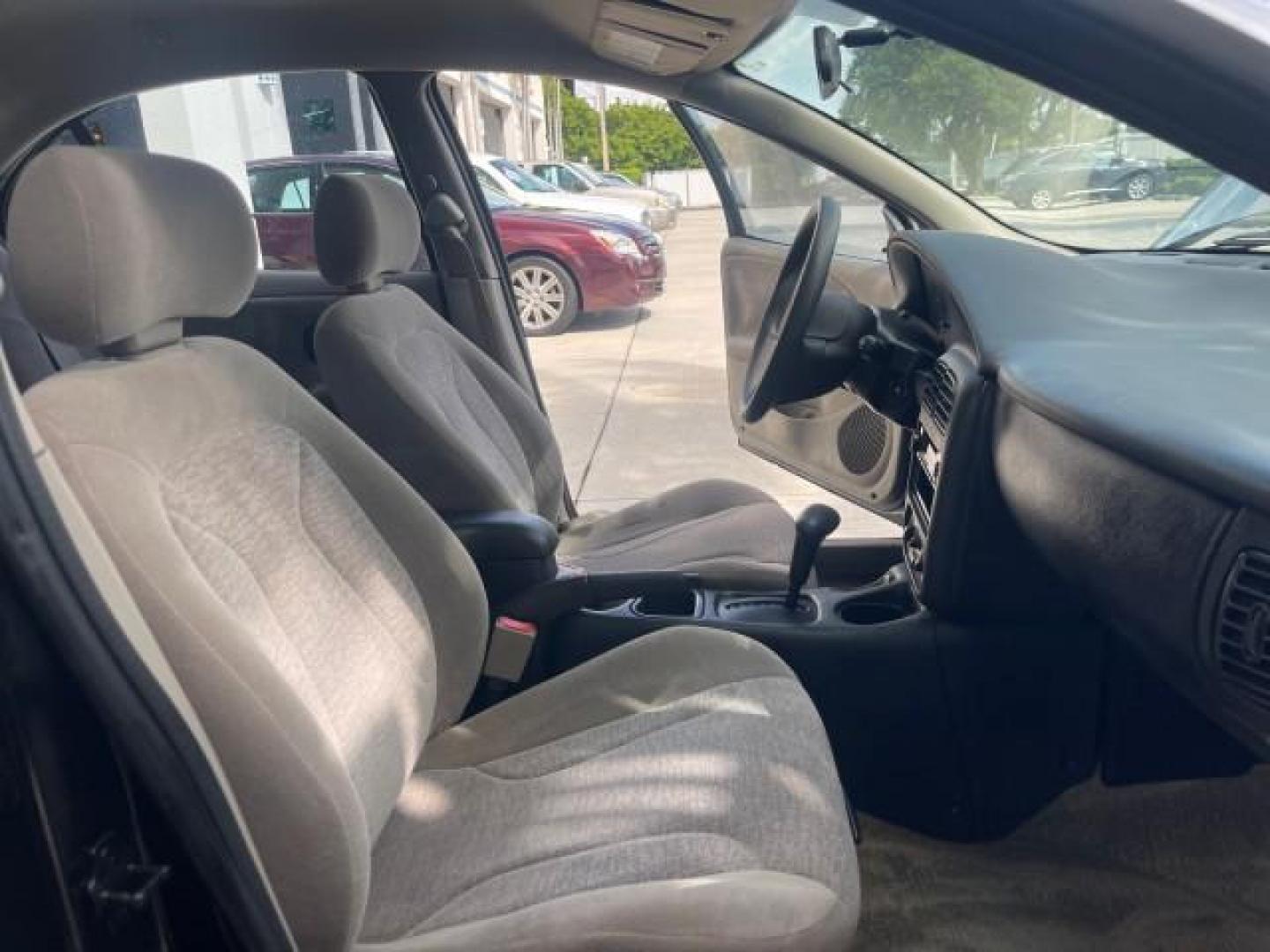 2002 Light Silver /Grey Saturn SL2 LOW MILES 51,437 1 OWNER FLORIDA (1G8ZK54782Z) with an 1.9L DOHC SPFI 16-Valve L4 Aluminum Engine engine, Automatic transmission, located at 4701 North Dixie Hwy, Pompano Beach, FL, 33064, (954) 422-2889, 26.240938, -80.123474 - OUR WEBPAGE FLORIDACARS1.COM HAS OVER 100 PHOTOS AND FREE CARFAX LINK 2002 SATURN S-SERIES SL2 VIN: 1G8ZK54782Z312050 1 G 8 Z K 5 4 7 8 2 Z 3 1 2 0 5 0 SEDAN 4 DR 1.9L I4 F DOHC 16V GASOLINE FRONT WHEEL DRIVE Features Air Conditioning AM/FM Stereo Automatic Transmission Cloth Seats Rear Defroster Pr - Photo#12