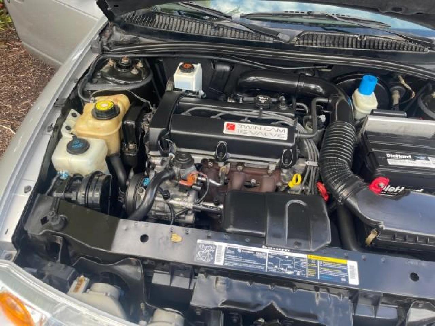 2002 Light Silver /Grey Saturn SL2 LOW MILES 51,437 1 OWNER FLORIDA (1G8ZK54782Z) with an 1.9L DOHC SPFI 16-Valve L4 Aluminum Engine engine, Automatic transmission, located at 4701 North Dixie Hwy, Pompano Beach, FL, 33064, (954) 422-2889, 26.240938, -80.123474 - OUR WEBPAGE FLORIDACARS1.COM HAS OVER 100 PHOTOS AND FREE CARFAX LINK 2002 SATURN S-SERIES SL2 VIN: 1G8ZK54782Z312050 1 G 8 Z K 5 4 7 8 2 Z 3 1 2 0 5 0 SEDAN 4 DR 1.9L I4 F DOHC 16V GASOLINE FRONT WHEEL DRIVE Features Air Conditioning AM/FM Stereo Automatic Transmission Cloth Seats Rear Defroster Pr - Photo#25