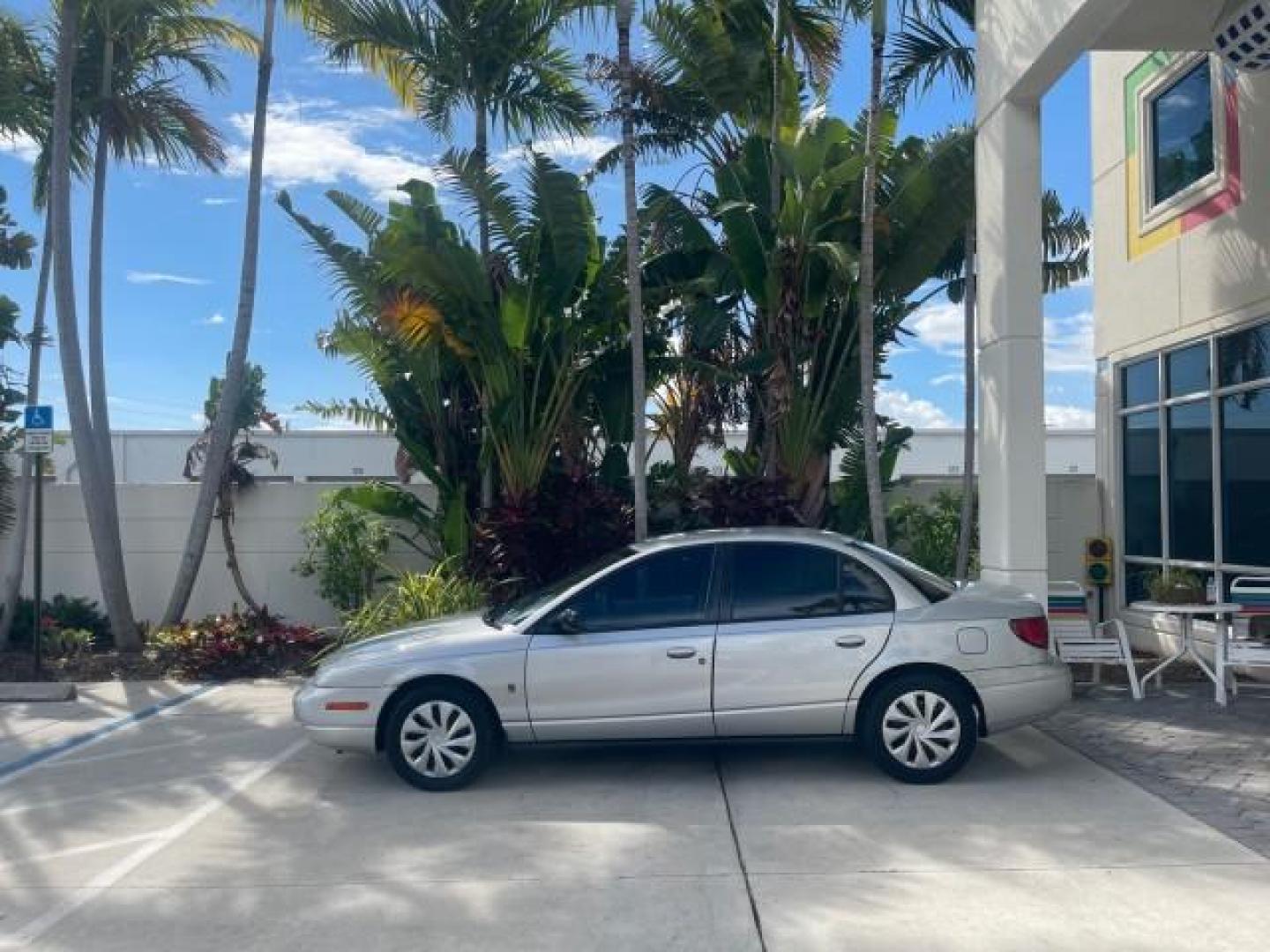 2002 Light Silver /Grey Saturn SL2 LOW MILES 51,437 1 OWNER FLORIDA (1G8ZK54782Z) with an 1.9L DOHC SPFI 16-Valve L4 Aluminum Engine engine, Automatic transmission, located at 4701 North Dixie Hwy, Pompano Beach, FL, 33064, (954) 422-2889, 26.240938, -80.123474 - OUR WEBPAGE FLORIDACARS1.COM HAS OVER 100 PHOTOS AND FREE CARFAX LINK 2002 SATURN S-SERIES SL2 VIN: 1G8ZK54782Z312050 1 G 8 Z K 5 4 7 8 2 Z 3 1 2 0 5 0 SEDAN 4 DR 1.9L I4 F DOHC 16V GASOLINE FRONT WHEEL DRIVE Features Air Conditioning AM/FM Stereo Automatic Transmission Cloth Seats Rear Defroster Pr - Photo#31