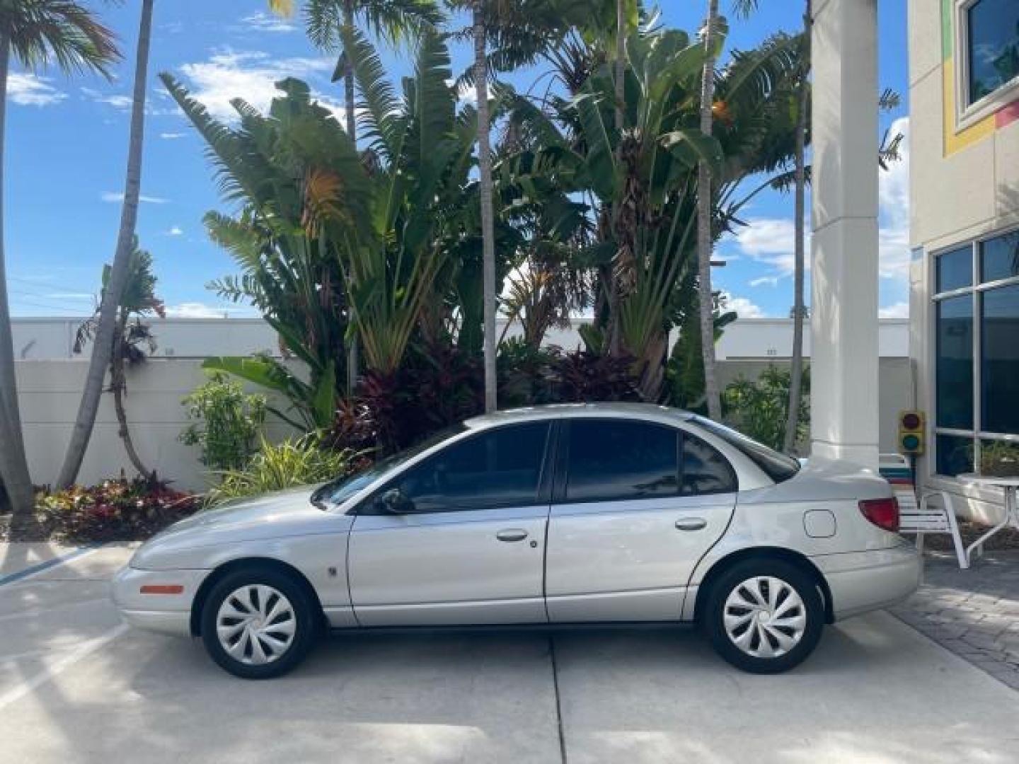 2002 Light Silver /Grey Saturn SL2 LOW MILES 51,437 1 OWNER FLORIDA (1G8ZK54782Z) with an 1.9L DOHC SPFI 16-Valve L4 Aluminum Engine engine, Automatic transmission, located at 4701 North Dixie Hwy, Pompano Beach, FL, 33064, (954) 422-2889, 26.240938, -80.123474 - OUR WEBPAGE FLORIDACARS1.COM HAS OVER 100 PHOTOS AND FREE CARFAX LINK 2002 SATURN S-SERIES SL2 VIN: 1G8ZK54782Z312050 1 G 8 Z K 5 4 7 8 2 Z 3 1 2 0 5 0 SEDAN 4 DR 1.9L I4 F DOHC 16V GASOLINE FRONT WHEEL DRIVE Features Air Conditioning AM/FM Stereo Automatic Transmission Cloth Seats Rear Defroster Pr - Photo#32
