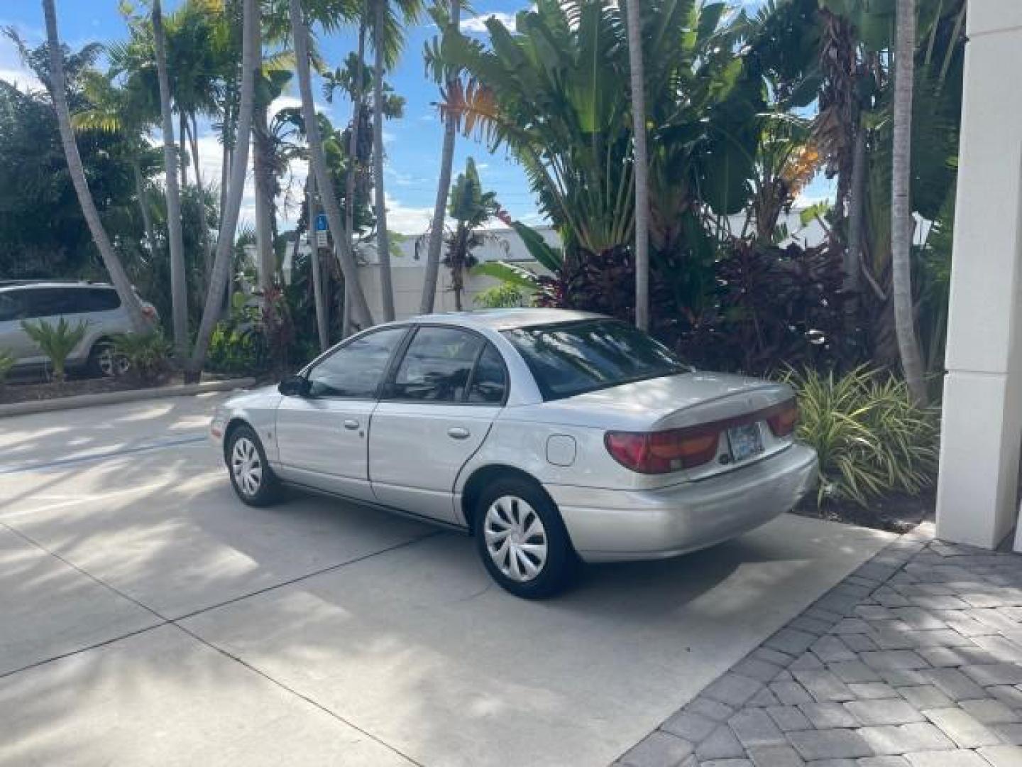 2002 Light Silver /Grey Saturn SL2 LOW MILES 51,437 1 OWNER FLORIDA (1G8ZK54782Z) with an 1.9L DOHC SPFI 16-Valve L4 Aluminum Engine engine, Automatic transmission, located at 4701 North Dixie Hwy, Pompano Beach, FL, 33064, (954) 422-2889, 26.240938, -80.123474 - OUR WEBPAGE FLORIDACARS1.COM HAS OVER 100 PHOTOS AND FREE CARFAX LINK 2002 SATURN S-SERIES SL2 VIN: 1G8ZK54782Z312050 1 G 8 Z K 5 4 7 8 2 Z 3 1 2 0 5 0 SEDAN 4 DR 1.9L I4 F DOHC 16V GASOLINE FRONT WHEEL DRIVE Features Air Conditioning AM/FM Stereo Automatic Transmission Cloth Seats Rear Defroster Pr - Photo#33