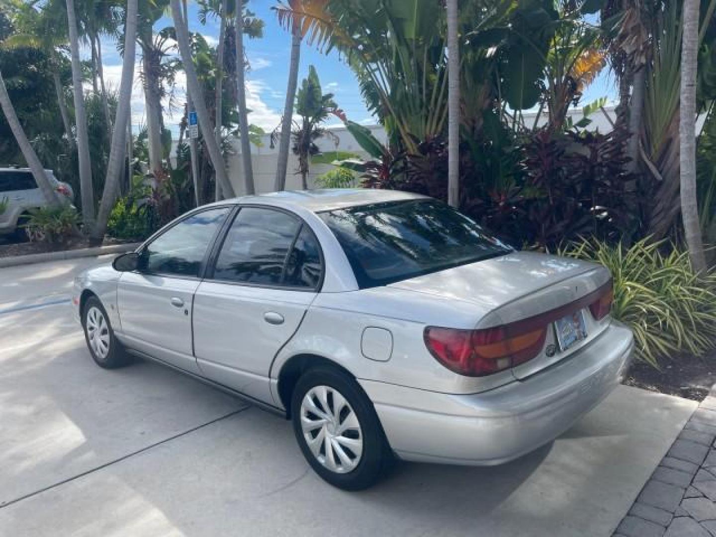 2002 Light Silver /Grey Saturn SL2 LOW MILES 51,437 1 OWNER FLORIDA (1G8ZK54782Z) with an 1.9L DOHC SPFI 16-Valve L4 Aluminum Engine engine, Automatic transmission, located at 4701 North Dixie Hwy, Pompano Beach, FL, 33064, (954) 422-2889, 26.240938, -80.123474 - OUR WEBPAGE FLORIDACARS1.COM HAS OVER 100 PHOTOS AND FREE CARFAX LINK 2002 SATURN S-SERIES SL2 VIN: 1G8ZK54782Z312050 1 G 8 Z K 5 4 7 8 2 Z 3 1 2 0 5 0 SEDAN 4 DR 1.9L I4 F DOHC 16V GASOLINE FRONT WHEEL DRIVE Features Air Conditioning AM/FM Stereo Automatic Transmission Cloth Seats Rear Defroster Pr - Photo#34