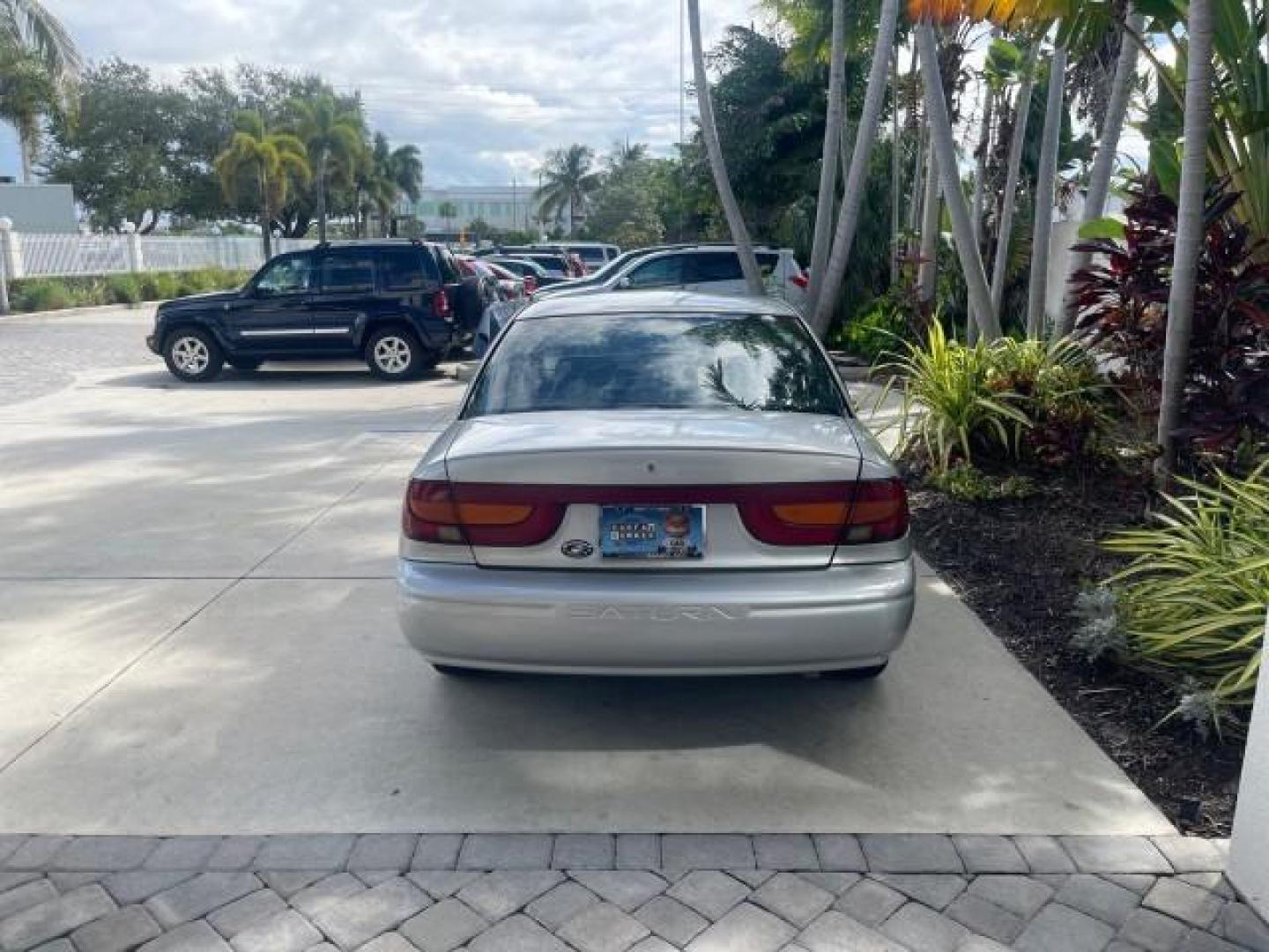 2002 Light Silver /Grey Saturn SL2 LOW MILES 51,437 1 OWNER FLORIDA (1G8ZK54782Z) with an 1.9L DOHC SPFI 16-Valve L4 Aluminum Engine engine, Automatic transmission, located at 4701 North Dixie Hwy, Pompano Beach, FL, 33064, (954) 422-2889, 26.240938, -80.123474 - OUR WEBPAGE FLORIDACARS1.COM HAS OVER 100 PHOTOS AND FREE CARFAX LINK 2002 SATURN S-SERIES SL2 VIN: 1G8ZK54782Z312050 1 G 8 Z K 5 4 7 8 2 Z 3 1 2 0 5 0 SEDAN 4 DR 1.9L I4 F DOHC 16V GASOLINE FRONT WHEEL DRIVE Features Air Conditioning AM/FM Stereo Automatic Transmission Cloth Seats Rear Defroster Pr - Photo#35