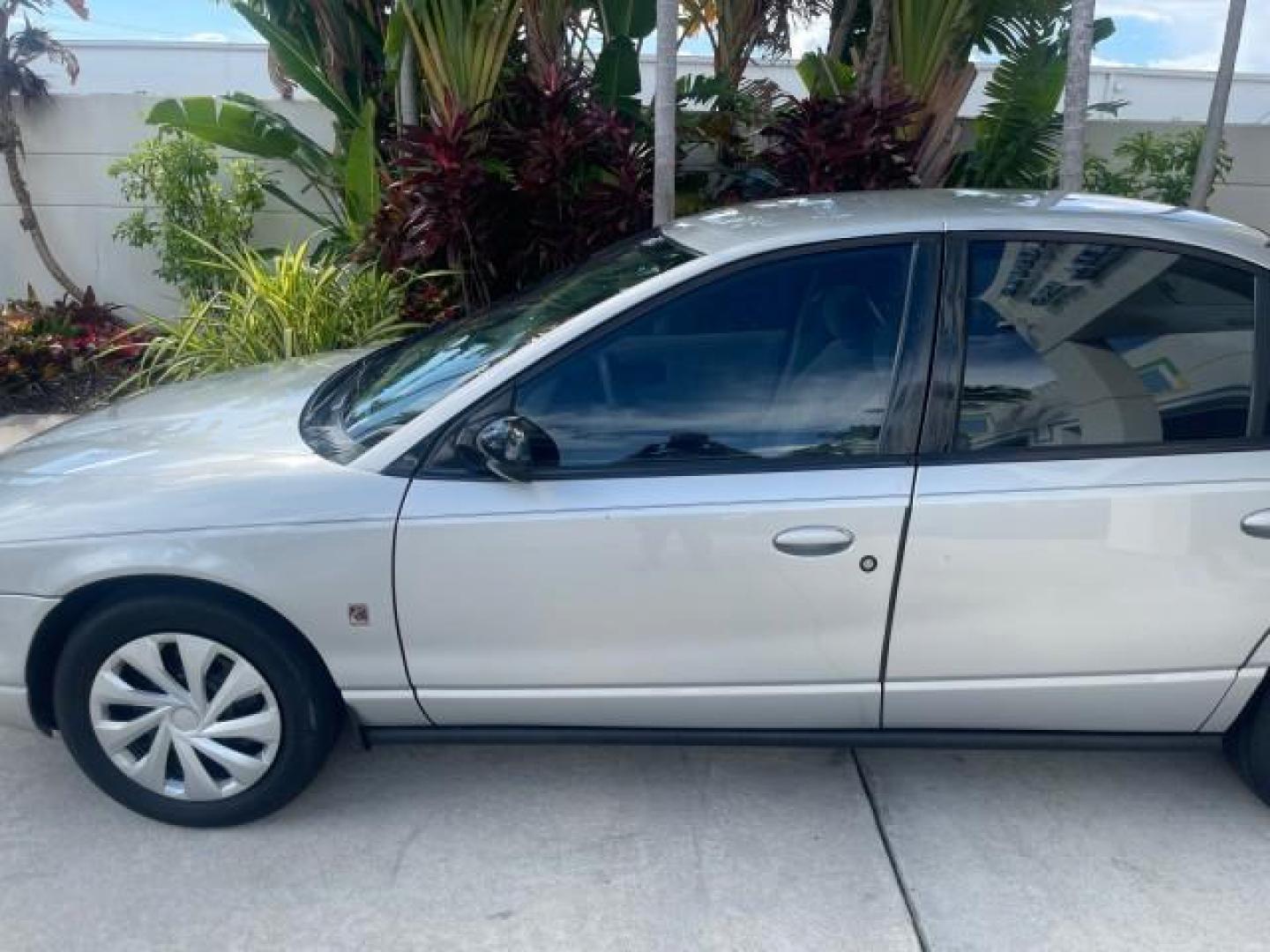 2002 Light Silver /Grey Saturn SL2 LOW MILES 51,437 1 OWNER FLORIDA (1G8ZK54782Z) with an 1.9L DOHC SPFI 16-Valve L4 Aluminum Engine engine, Automatic transmission, located at 4701 North Dixie Hwy, Pompano Beach, FL, 33064, (954) 422-2889, 26.240938, -80.123474 - OUR WEBPAGE FLORIDACARS1.COM HAS OVER 100 PHOTOS AND FREE CARFAX LINK 2002 SATURN S-SERIES SL2 VIN: 1G8ZK54782Z312050 1 G 8 Z K 5 4 7 8 2 Z 3 1 2 0 5 0 SEDAN 4 DR 1.9L I4 F DOHC 16V GASOLINE FRONT WHEEL DRIVE Features Air Conditioning AM/FM Stereo Automatic Transmission Cloth Seats Rear Defroster Pr - Photo#37