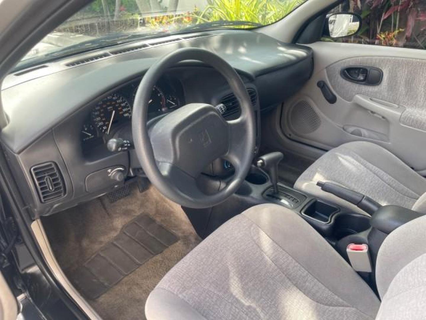 2002 Light Silver /Grey Saturn SL2 LOW MILES 51,437 1 OWNER FLORIDA (1G8ZK54782Z) with an 1.9L DOHC SPFI 16-Valve L4 Aluminum Engine engine, Automatic transmission, located at 4701 North Dixie Hwy, Pompano Beach, FL, 33064, (954) 422-2889, 26.240938, -80.123474 - OUR WEBPAGE FLORIDACARS1.COM HAS OVER 100 PHOTOS AND FREE CARFAX LINK 2002 SATURN S-SERIES SL2 VIN: 1G8ZK54782Z312050 1 G 8 Z K 5 4 7 8 2 Z 3 1 2 0 5 0 SEDAN 4 DR 1.9L I4 F DOHC 16V GASOLINE FRONT WHEEL DRIVE Features Air Conditioning AM/FM Stereo Automatic Transmission Cloth Seats Rear Defroster Pr - Photo#48