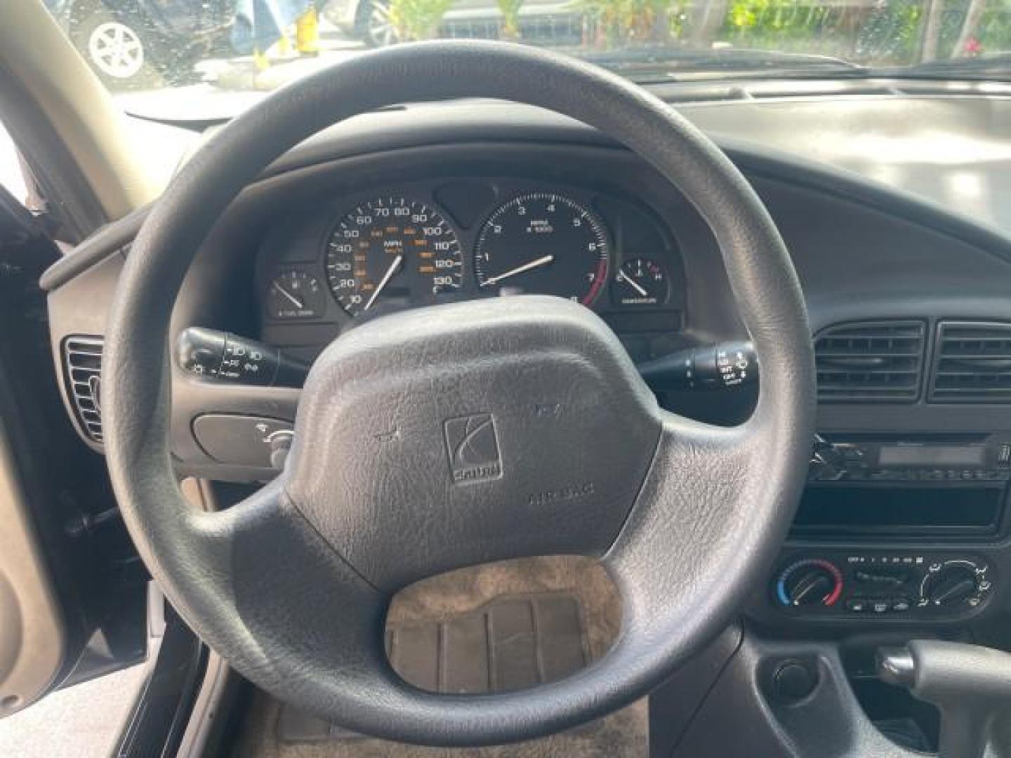 2002 Light Silver /Grey Saturn SL2 LOW MILES 51,437 1 OWNER FLORIDA (1G8ZK54782Z) with an 1.9L DOHC SPFI 16-Valve L4 Aluminum Engine engine, Automatic transmission, located at 4701 North Dixie Hwy, Pompano Beach, FL, 33064, (954) 422-2889, 26.240938, -80.123474 - OUR WEBPAGE FLORIDACARS1.COM HAS OVER 100 PHOTOS AND FREE CARFAX LINK 2002 SATURN S-SERIES SL2 VIN: 1G8ZK54782Z312050 1 G 8 Z K 5 4 7 8 2 Z 3 1 2 0 5 0 SEDAN 4 DR 1.9L I4 F DOHC 16V GASOLINE FRONT WHEEL DRIVE Features Air Conditioning AM/FM Stereo Automatic Transmission Cloth Seats Rear Defroster Pr - Photo#49
