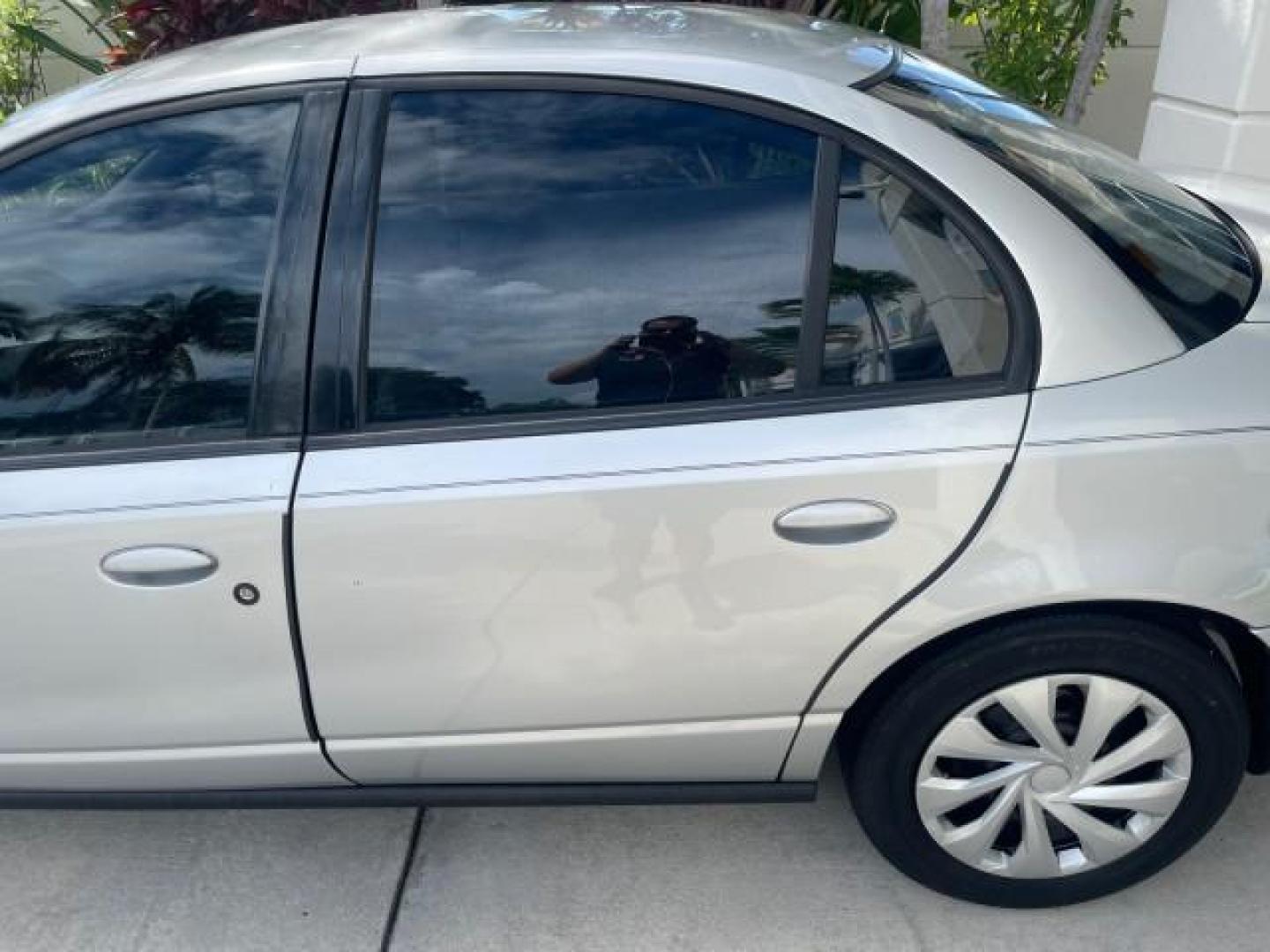 2002 Light Silver /Grey Saturn SL2 LOW MILES 51,437 1 OWNER FLORIDA (1G8ZK54782Z) with an 1.9L DOHC SPFI 16-Valve L4 Aluminum Engine engine, Automatic transmission, located at 4701 North Dixie Hwy, Pompano Beach, FL, 33064, (954) 422-2889, 26.240938, -80.123474 - OUR WEBPAGE FLORIDACARS1.COM HAS OVER 100 PHOTOS AND FREE CARFAX LINK 2002 SATURN S-SERIES SL2 VIN: 1G8ZK54782Z312050 1 G 8 Z K 5 4 7 8 2 Z 3 1 2 0 5 0 SEDAN 4 DR 1.9L I4 F DOHC 16V GASOLINE FRONT WHEEL DRIVE Features Air Conditioning AM/FM Stereo Automatic Transmission Cloth Seats Rear Defroster Pr - Photo#66