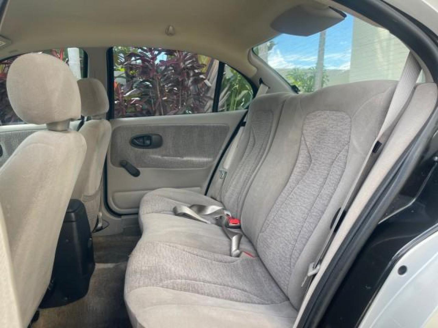 2002 Light Silver /Grey Saturn SL2 LOW MILES 51,437 1 OWNER FLORIDA (1G8ZK54782Z) with an 1.9L DOHC SPFI 16-Valve L4 Aluminum Engine engine, Automatic transmission, located at 4701 North Dixie Hwy, Pompano Beach, FL, 33064, (954) 422-2889, 26.240938, -80.123474 - OUR WEBPAGE FLORIDACARS1.COM HAS OVER 100 PHOTOS AND FREE CARFAX LINK 2002 SATURN S-SERIES SL2 VIN: 1G8ZK54782Z312050 1 G 8 Z K 5 4 7 8 2 Z 3 1 2 0 5 0 SEDAN 4 DR 1.9L I4 F DOHC 16V GASOLINE FRONT WHEEL DRIVE Features Air Conditioning AM/FM Stereo Automatic Transmission Cloth Seats Rear Defroster Pr - Photo#69