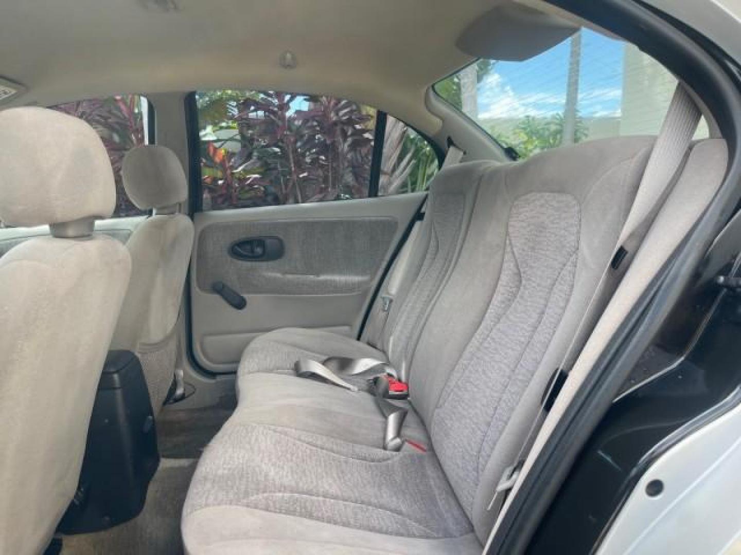 2002 Light Silver /Grey Saturn SL2 LOW MILES 51,437 1 OWNER FLORIDA (1G8ZK54782Z) with an 1.9L DOHC SPFI 16-Valve L4 Aluminum Engine engine, Automatic transmission, located at 4701 North Dixie Hwy, Pompano Beach, FL, 33064, (954) 422-2889, 26.240938, -80.123474 - OUR WEBPAGE FLORIDACARS1.COM HAS OVER 100 PHOTOS AND FREE CARFAX LINK 2002 SATURN S-SERIES SL2 VIN: 1G8ZK54782Z312050 1 G 8 Z K 5 4 7 8 2 Z 3 1 2 0 5 0 SEDAN 4 DR 1.9L I4 F DOHC 16V GASOLINE FRONT WHEEL DRIVE Features Air Conditioning AM/FM Stereo Automatic Transmission Cloth Seats Rear Defroster Pr - Photo#70