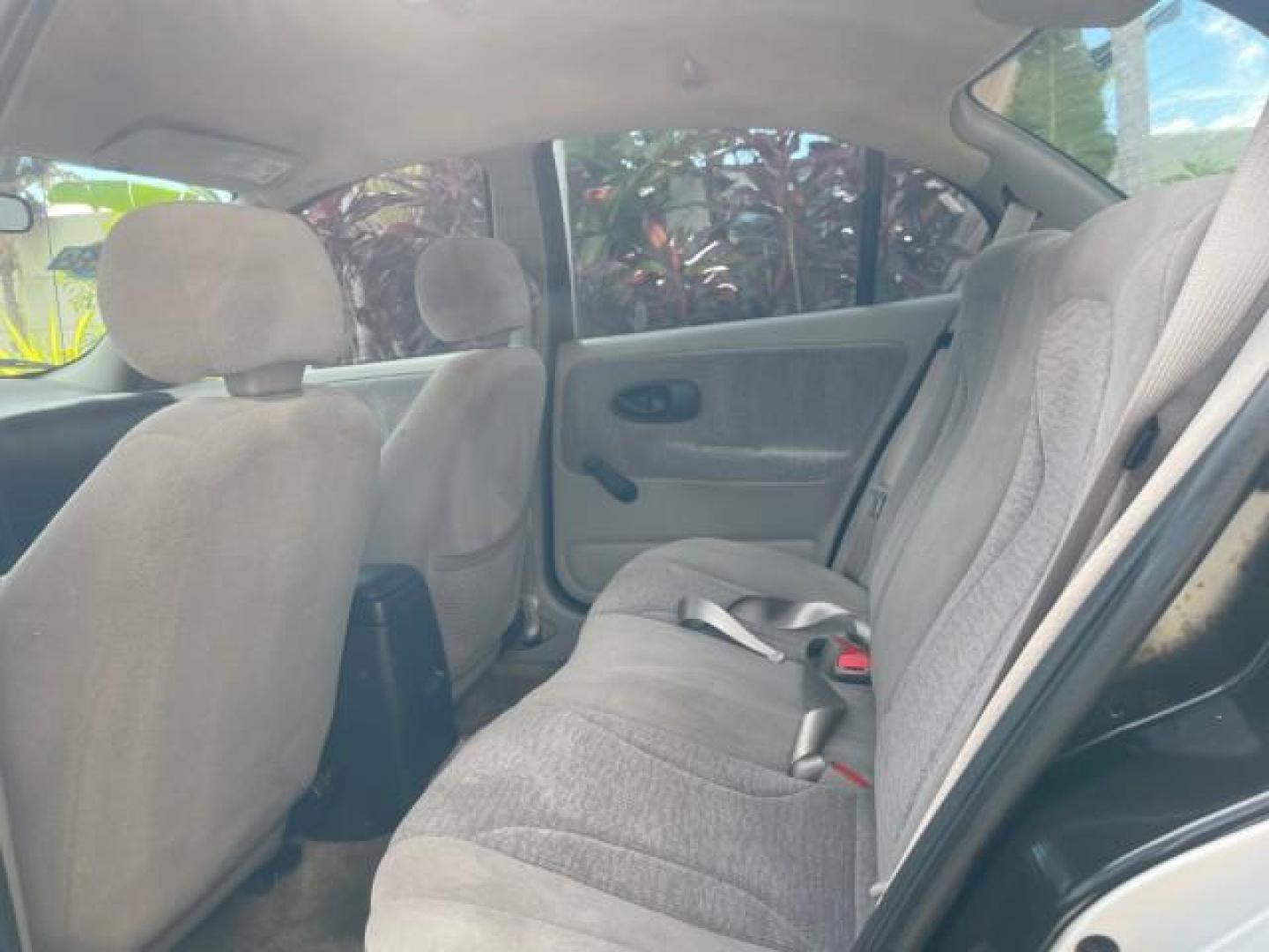 2002 Light Silver /Grey Saturn SL2 LOW MILES 51,437 1 OWNER FLORIDA (1G8ZK54782Z) with an 1.9L DOHC SPFI 16-Valve L4 Aluminum Engine engine, Automatic transmission, located at 4701 North Dixie Hwy, Pompano Beach, FL, 33064, (954) 422-2889, 26.240938, -80.123474 - OUR WEBPAGE FLORIDACARS1.COM HAS OVER 100 PHOTOS AND FREE CARFAX LINK 2002 SATURN S-SERIES SL2 VIN: 1G8ZK54782Z312050 1 G 8 Z K 5 4 7 8 2 Z 3 1 2 0 5 0 SEDAN 4 DR 1.9L I4 F DOHC 16V GASOLINE FRONT WHEEL DRIVE Features Air Conditioning AM/FM Stereo Automatic Transmission Cloth Seats Rear Defroster Pr - Photo#72
