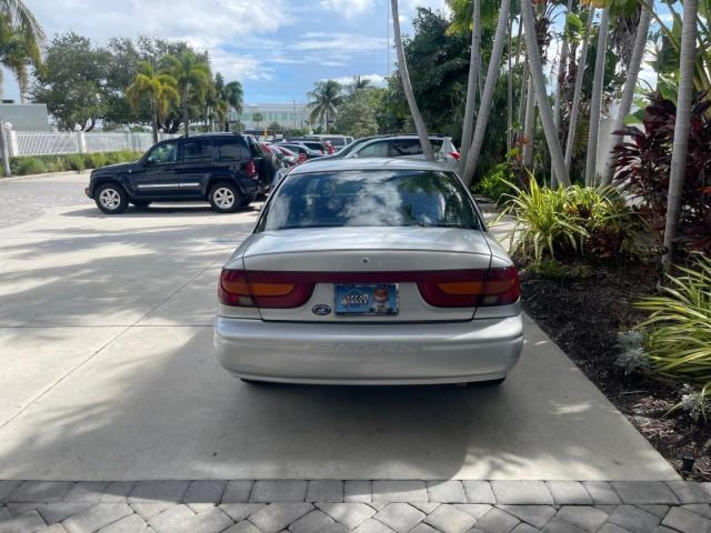 2002 Light Silver /Grey Saturn SL2 LOW MILES 51,437 1 OWNER FLORIDA (1G8ZK54782Z) with an 1.9L DOHC SPFI 16-Valve L4 Aluminum Engine engine, Automatic transmission, located at 4701 North Dixie Hwy, Pompano Beach, FL, 33064, (954) 422-2889, 26.240938, -80.123474 - OUR WEBPAGE FLORIDACARS1.COM HAS OVER 100 PHOTOS AND FREE CARFAX LINK 2002 SATURN S-SERIES SL2 VIN: 1G8ZK54782Z312050 1 G 8 Z K 5 4 7 8 2 Z 3 1 2 0 5 0 SEDAN 4 DR 1.9L I4 F DOHC 16V GASOLINE FRONT WHEEL DRIVE Features Air Conditioning AM/FM Stereo Automatic Transmission Cloth Seats Rear Defroster Pr - Photo#83