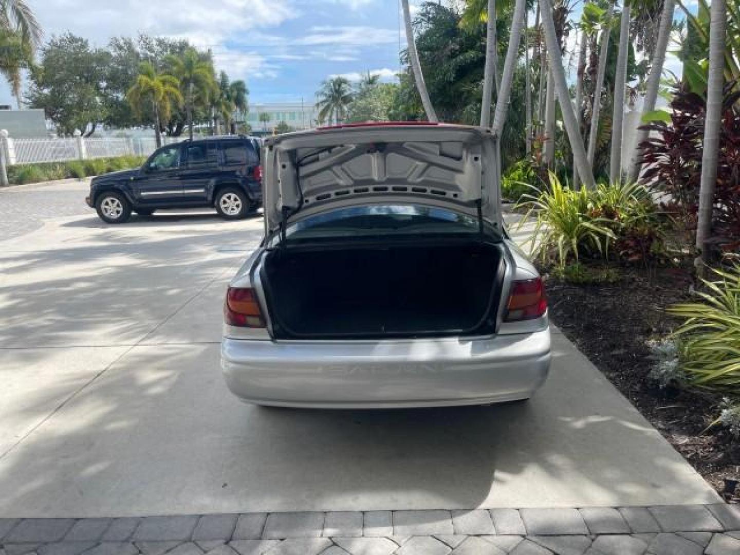 2002 Light Silver /Grey Saturn SL2 LOW MILES 51,437 1 OWNER FLORIDA (1G8ZK54782Z) with an 1.9L DOHC SPFI 16-Valve L4 Aluminum Engine engine, Automatic transmission, located at 4701 North Dixie Hwy, Pompano Beach, FL, 33064, (954) 422-2889, 26.240938, -80.123474 - OUR WEBPAGE FLORIDACARS1.COM HAS OVER 100 PHOTOS AND FREE CARFAX LINK 2002 SATURN S-SERIES SL2 VIN: 1G8ZK54782Z312050 1 G 8 Z K 5 4 7 8 2 Z 3 1 2 0 5 0 SEDAN 4 DR 1.9L I4 F DOHC 16V GASOLINE FRONT WHEEL DRIVE Features Air Conditioning AM/FM Stereo Automatic Transmission Cloth Seats Rear Defroster Pr - Photo#85