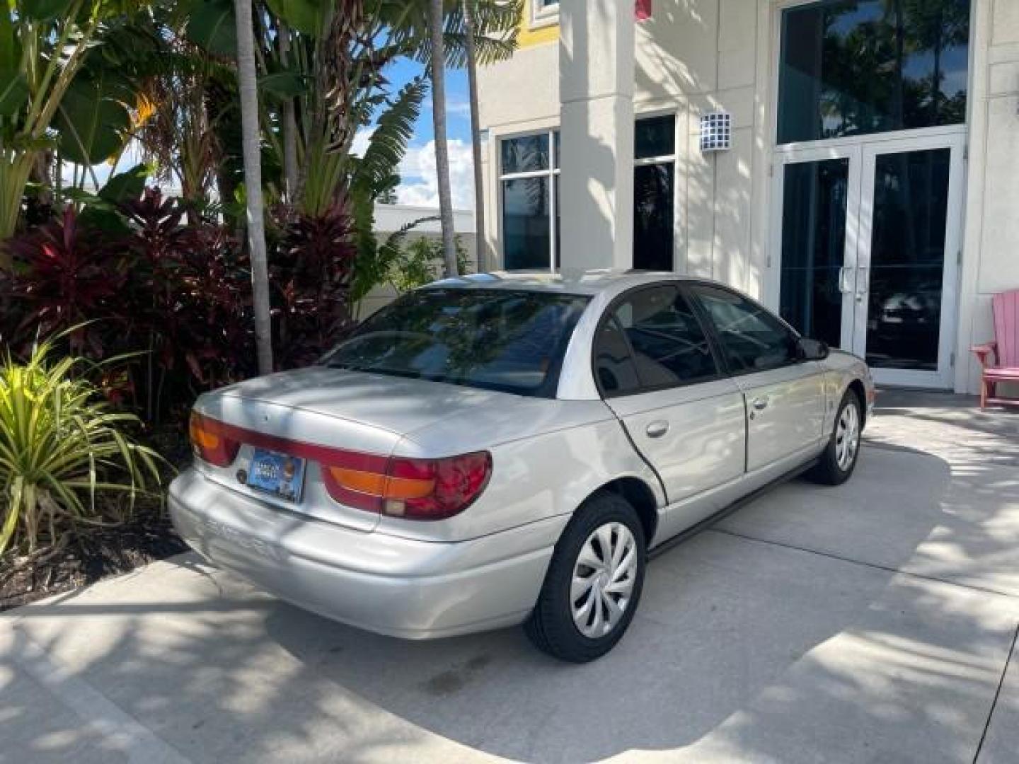 2002 Light Silver /Grey Saturn SL2 LOW MILES 51,437 1 OWNER FLORIDA (1G8ZK54782Z) with an 1.9L DOHC SPFI 16-Valve L4 Aluminum Engine engine, Automatic transmission, located at 4701 North Dixie Hwy, Pompano Beach, FL, 33064, (954) 422-2889, 26.240938, -80.123474 - OUR WEBPAGE FLORIDACARS1.COM HAS OVER 100 PHOTOS AND FREE CARFAX LINK 2002 SATURN S-SERIES SL2 VIN: 1G8ZK54782Z312050 1 G 8 Z K 5 4 7 8 2 Z 3 1 2 0 5 0 SEDAN 4 DR 1.9L I4 F DOHC 16V GASOLINE FRONT WHEEL DRIVE Features Air Conditioning AM/FM Stereo Automatic Transmission Cloth Seats Rear Defroster Pr - Photo#92