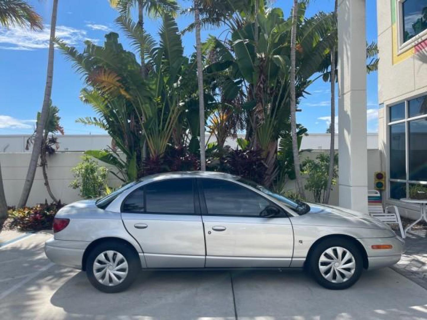 2002 Light Silver /Grey Saturn SL2 LOW MILES 51,437 1 OWNER FLORIDA (1G8ZK54782Z) with an 1.9L DOHC SPFI 16-Valve L4 Aluminum Engine engine, Automatic transmission, located at 4701 North Dixie Hwy, Pompano Beach, FL, 33064, (954) 422-2889, 26.240938, -80.123474 - OUR WEBPAGE FLORIDACARS1.COM HAS OVER 100 PHOTOS AND FREE CARFAX LINK 2002 SATURN S-SERIES SL2 VIN: 1G8ZK54782Z312050 1 G 8 Z K 5 4 7 8 2 Z 3 1 2 0 5 0 SEDAN 4 DR 1.9L I4 F DOHC 16V GASOLINE FRONT WHEEL DRIVE Features Air Conditioning AM/FM Stereo Automatic Transmission Cloth Seats Rear Defroster Pr - Photo#94