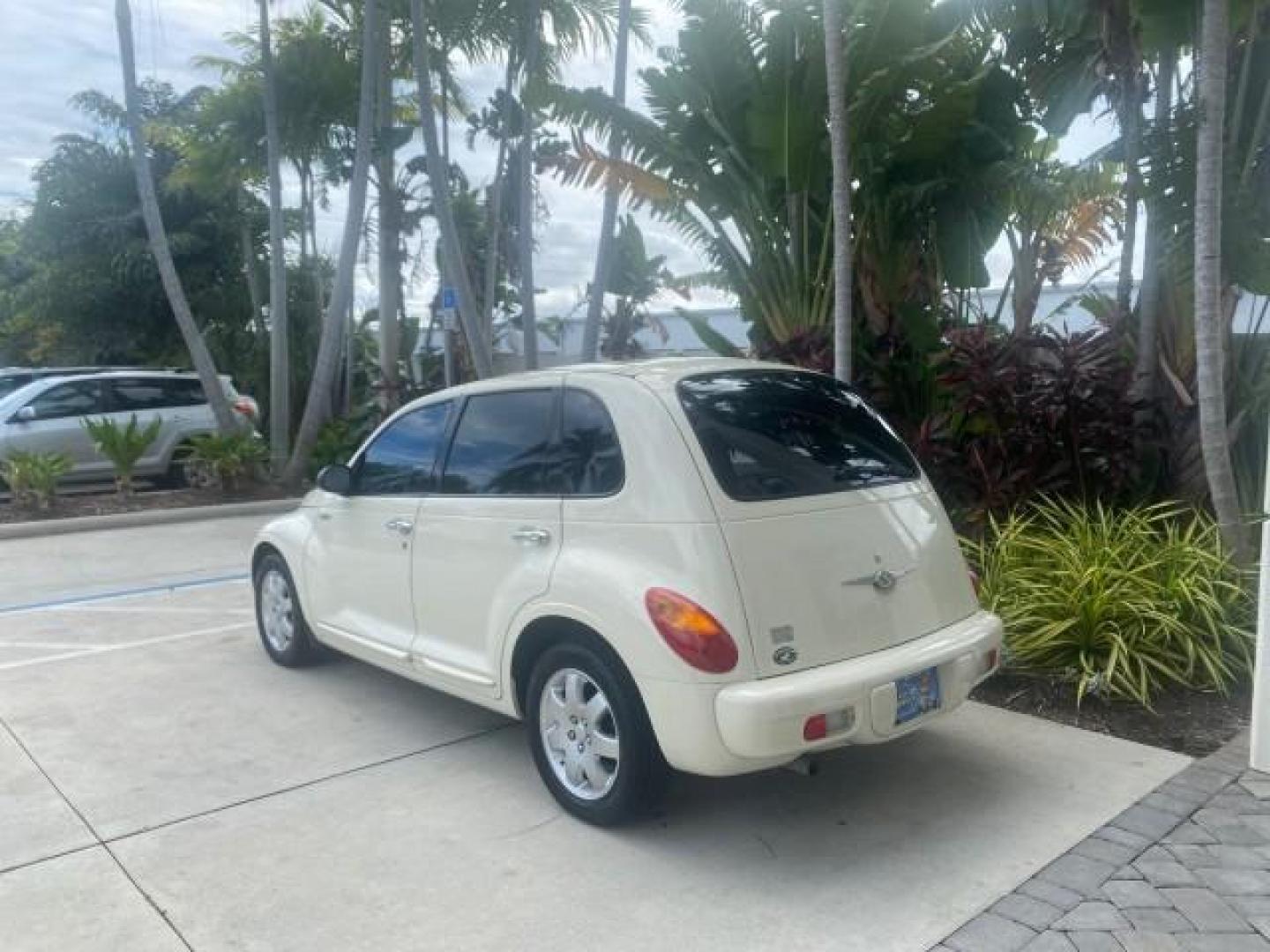 2004 Cool Vanilla /Dark Slate Gray Chrysler PT Cruiser Touring LOW MILES 46,180 (3C4FY58B34T) with an 2.4L 4-Cyl Engine engine, Automatic transmission, located at 4701 North Dixie Hwy, Pompano Beach, FL, 33064, (954) 422-2889, 26.240938, -80.123474 - OUR WEBPAGE FLORIDACARS1.COM HAS OVER 100 PHOTOS AND FREE CARFAX LINK 2004 CHRYSLER PT CRUISER TOURING EDITION VIN: 3C4FY58B34T209277 3 C 4 F Y 5 8 B 3 4 T 2 0 9 2 7 7 VAN 2.4L I4 F DOHC 16V GASOLINE 29 MPG FRONT WHEEL DRIVE Features Air Conditioning Alloy Wheels AM/FM Stereo Automatic Transmission - Photo#5