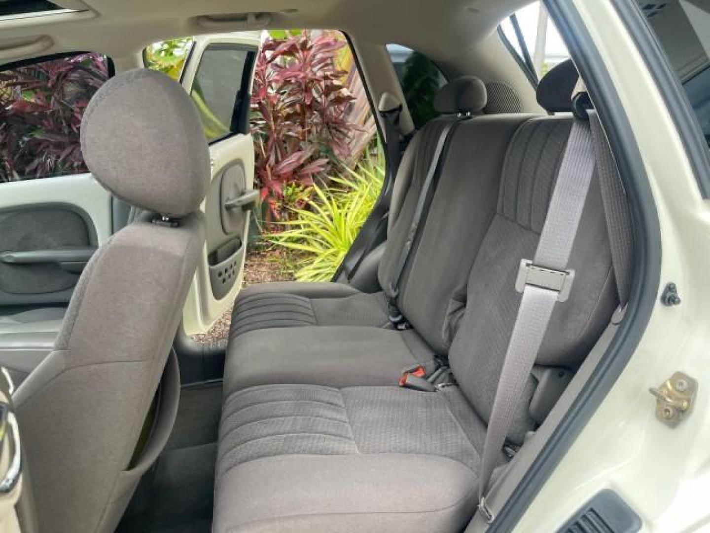 2004 Cool Vanilla /Dark Slate Gray Chrysler PT Cruiser Touring LOW MILES 46,180 (3C4FY58B34T) with an 2.4L 4-Cyl Engine engine, Automatic transmission, located at 4701 North Dixie Hwy, Pompano Beach, FL, 33064, (954) 422-2889, 26.240938, -80.123474 - OUR WEBPAGE FLORIDACARS1.COM HAS OVER 100 PHOTOS AND FREE CARFAX LINK 2004 CHRYSLER PT CRUISER TOURING EDITION VIN: 3C4FY58B34T209277 3 C 4 F Y 5 8 B 3 4 T 2 0 9 2 7 7 VAN 2.4L I4 F DOHC 16V GASOLINE 29 MPG FRONT WHEEL DRIVE Features Air Conditioning Alloy Wheels AM/FM Stereo Automatic Transmission - Photo#14