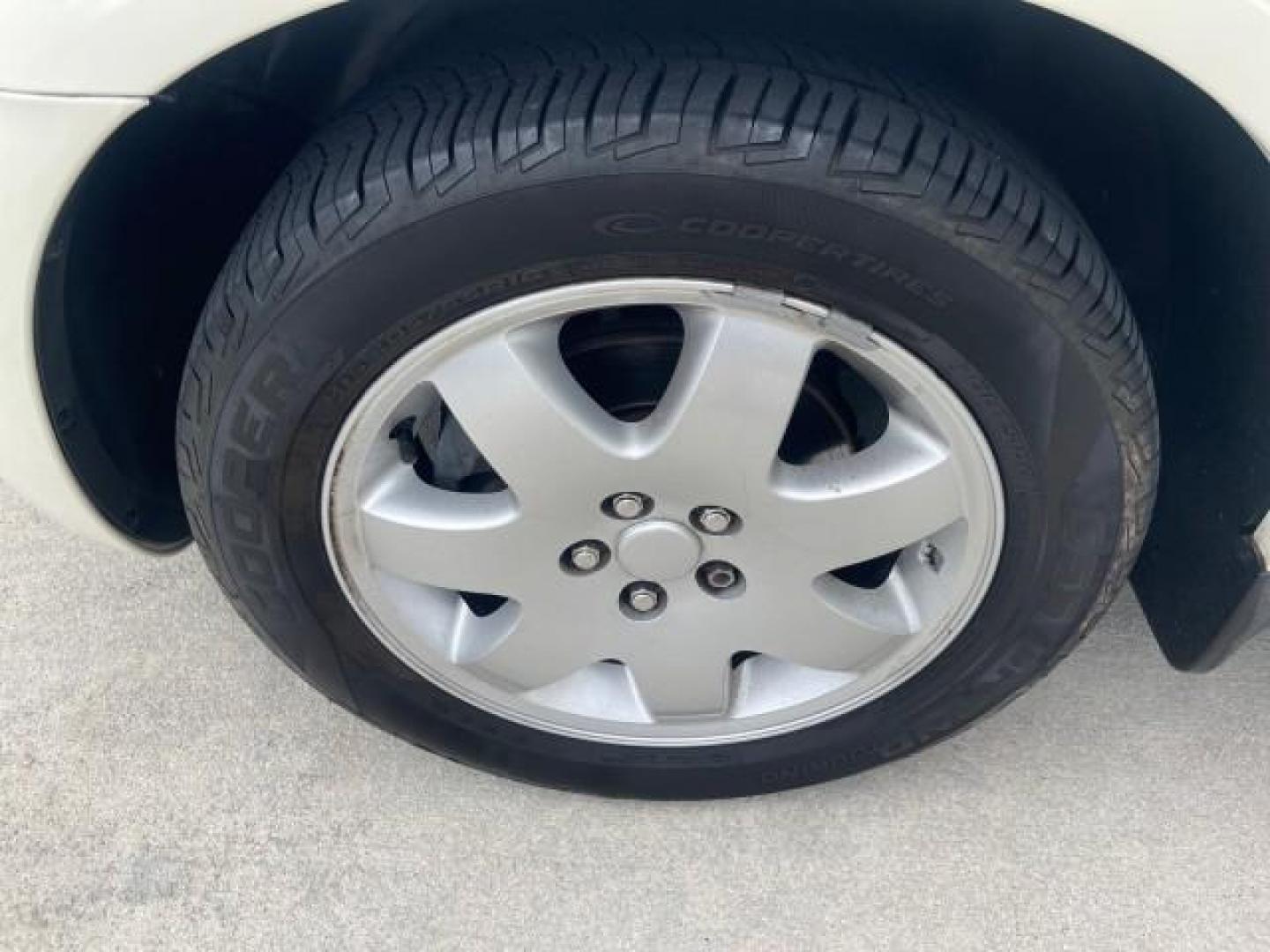 2004 Cool Vanilla /Dark Slate Gray Chrysler PT Cruiser Touring LOW MILES 46,180 (3C4FY58B34T) with an 2.4L 4-Cyl Engine engine, Automatic transmission, located at 4701 North Dixie Hwy, Pompano Beach, FL, 33064, (954) 422-2889, 26.240938, -80.123474 - OUR WEBPAGE FLORIDACARS1.COM HAS OVER 100 PHOTOS AND FREE CARFAX LINK 2004 CHRYSLER PT CRUISER TOURING EDITION VIN: 3C4FY58B34T209277 3 C 4 F Y 5 8 B 3 4 T 2 0 9 2 7 7 VAN 2.4L I4 F DOHC 16V GASOLINE 29 MPG FRONT WHEEL DRIVE Features Air Conditioning Alloy Wheels AM/FM Stereo Automatic Transmission - Photo#19