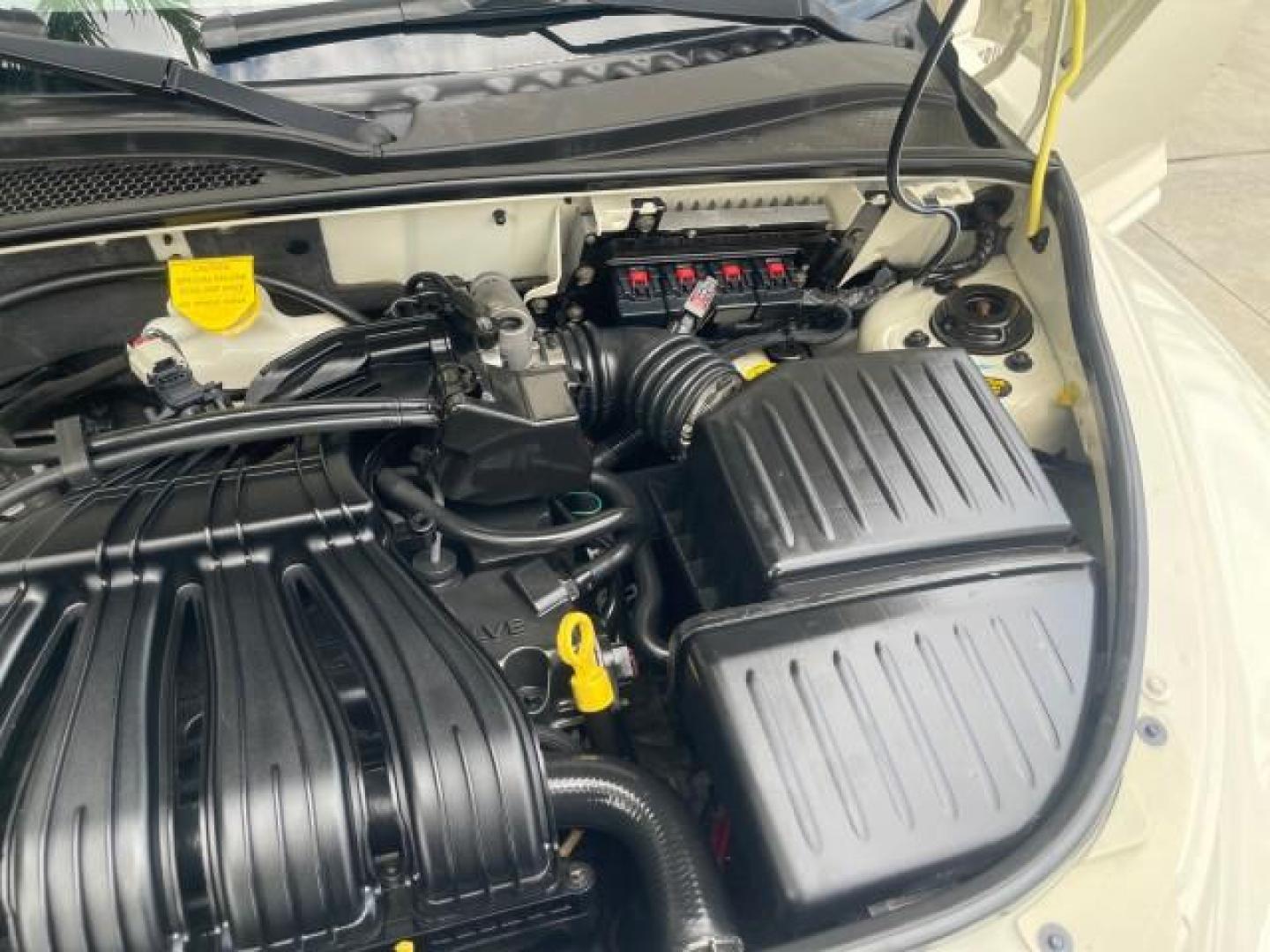 2004 Cool Vanilla /Dark Slate Gray Chrysler PT Cruiser Touring LOW MILES 46,180 (3C4FY58B34T) with an 2.4L 4-Cyl Engine engine, Automatic transmission, located at 4701 North Dixie Hwy, Pompano Beach, FL, 33064, (954) 422-2889, 26.240938, -80.123474 - OUR WEBPAGE FLORIDACARS1.COM HAS OVER 100 PHOTOS AND FREE CARFAX LINK 2004 CHRYSLER PT CRUISER TOURING EDITION VIN: 3C4FY58B34T209277 3 C 4 F Y 5 8 B 3 4 T 2 0 9 2 7 7 VAN 2.4L I4 F DOHC 16V GASOLINE 29 MPG FRONT WHEEL DRIVE Features Air Conditioning Alloy Wheels AM/FM Stereo Automatic Transmission - Photo#26