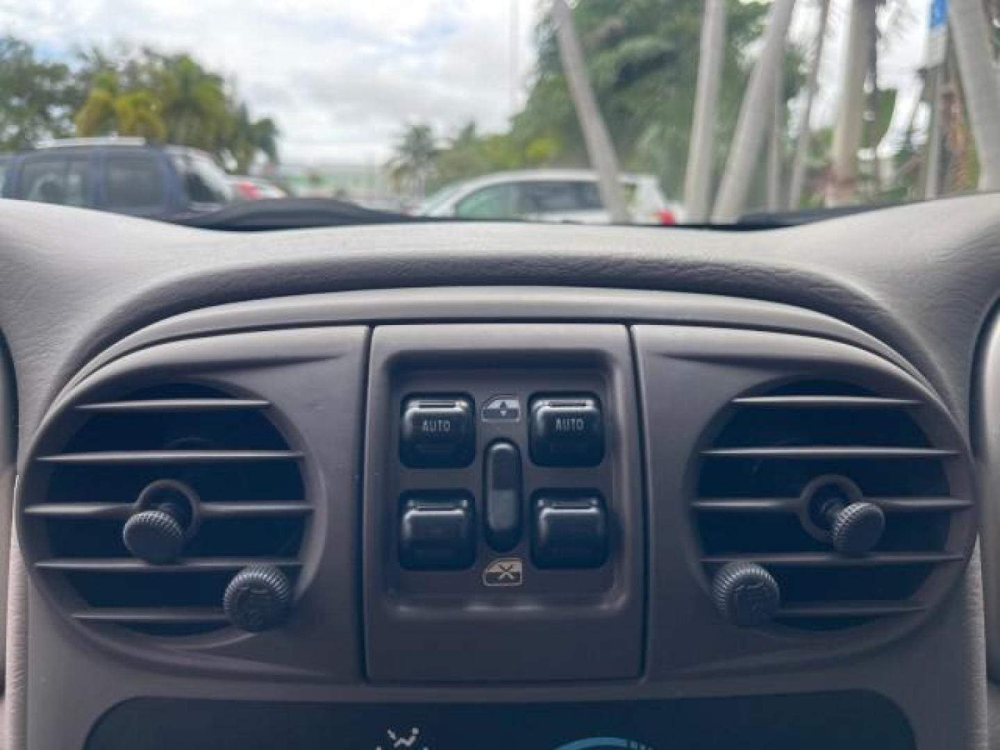 2004 Cool Vanilla /Dark Slate Gray Chrysler PT Cruiser Touring LOW MILES 46,180 (3C4FY58B34T) with an 2.4L 4-Cyl Engine engine, Automatic transmission, located at 4701 North Dixie Hwy, Pompano Beach, FL, 33064, (954) 422-2889, 26.240938, -80.123474 - OUR WEBPAGE FLORIDACARS1.COM HAS OVER 100 PHOTOS AND FREE CARFAX LINK 2004 CHRYSLER PT CRUISER TOURING EDITION VIN: 3C4FY58B34T209277 3 C 4 F Y 5 8 B 3 4 T 2 0 9 2 7 7 VAN 2.4L I4 F DOHC 16V GASOLINE 29 MPG FRONT WHEEL DRIVE Features Air Conditioning Alloy Wheels AM/FM Stereo Automatic Transmission - Photo#57