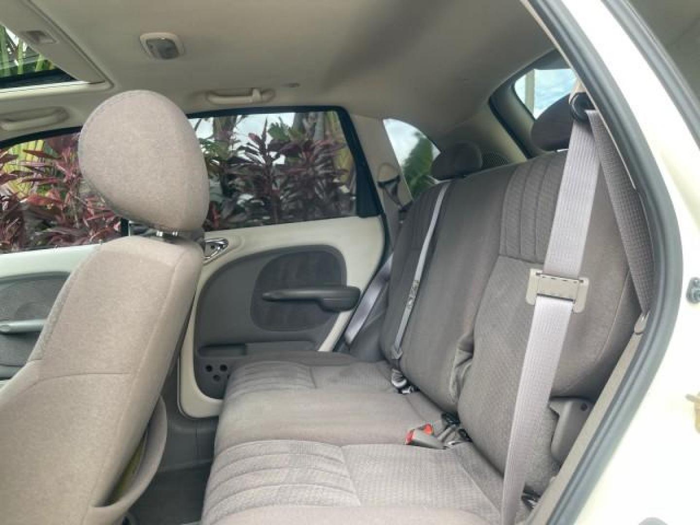 2004 Cool Vanilla /Dark Slate Gray Chrysler PT Cruiser Touring LOW MILES 46,180 (3C4FY58B34T) with an 2.4L 4-Cyl Engine engine, Automatic transmission, located at 4701 North Dixie Hwy, Pompano Beach, FL, 33064, (954) 422-2889, 26.240938, -80.123474 - OUR WEBPAGE FLORIDACARS1.COM HAS OVER 100 PHOTOS AND FREE CARFAX LINK 2004 CHRYSLER PT CRUISER TOURING EDITION VIN: 3C4FY58B34T209277 3 C 4 F Y 5 8 B 3 4 T 2 0 9 2 7 7 VAN 2.4L I4 F DOHC 16V GASOLINE 29 MPG FRONT WHEEL DRIVE Features Air Conditioning Alloy Wheels AM/FM Stereo Automatic Transmission - Photo#76
