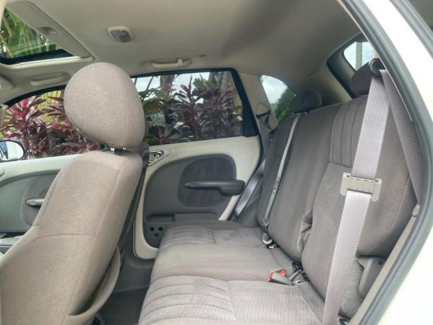 2004 Cool Vanilla /Dark Slate Gray Chrysler PT Cruiser Touring LOW MILES 46,180 (3C4FY58B34T) with an 2.4L 4-Cyl Engine engine, Automatic transmission, located at 4701 North Dixie Hwy, Pompano Beach, FL, 33064, (954) 422-2889, 26.240938, -80.123474 - OUR WEBPAGE FLORIDACARS1.COM HAS OVER 100 PHOTOS AND FREE CARFAX LINK 2004 CHRYSLER PT CRUISER TOURING EDITION VIN: 3C4FY58B34T209277 3 C 4 F Y 5 8 B 3 4 T 2 0 9 2 7 7 VAN 2.4L I4 F DOHC 16V GASOLINE 29 MPG FRONT WHEEL DRIVE Features Air Conditioning Alloy Wheels AM/FM Stereo Automatic Transmission - Photo#77