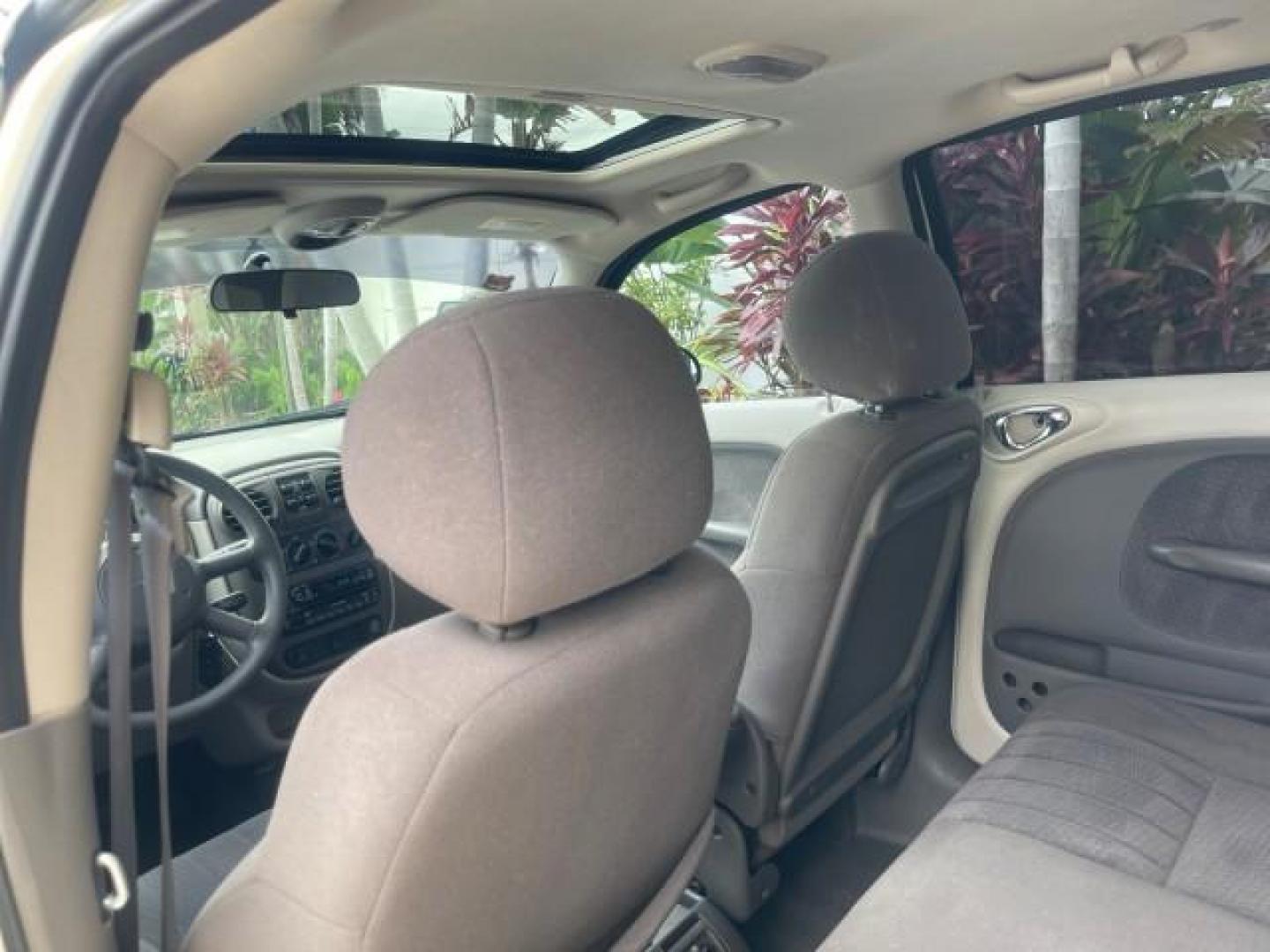 2004 Cool Vanilla /Dark Slate Gray Chrysler PT Cruiser Touring LOW MILES 46,180 (3C4FY58B34T) with an 2.4L 4-Cyl Engine engine, Automatic transmission, located at 4701 North Dixie Hwy, Pompano Beach, FL, 33064, (954) 422-2889, 26.240938, -80.123474 - OUR WEBPAGE FLORIDACARS1.COM HAS OVER 100 PHOTOS AND FREE CARFAX LINK 2004 CHRYSLER PT CRUISER TOURING EDITION VIN: 3C4FY58B34T209277 3 C 4 F Y 5 8 B 3 4 T 2 0 9 2 7 7 VAN 2.4L I4 F DOHC 16V GASOLINE 29 MPG FRONT WHEEL DRIVE Features Air Conditioning Alloy Wheels AM/FM Stereo Automatic Transmission - Photo#80