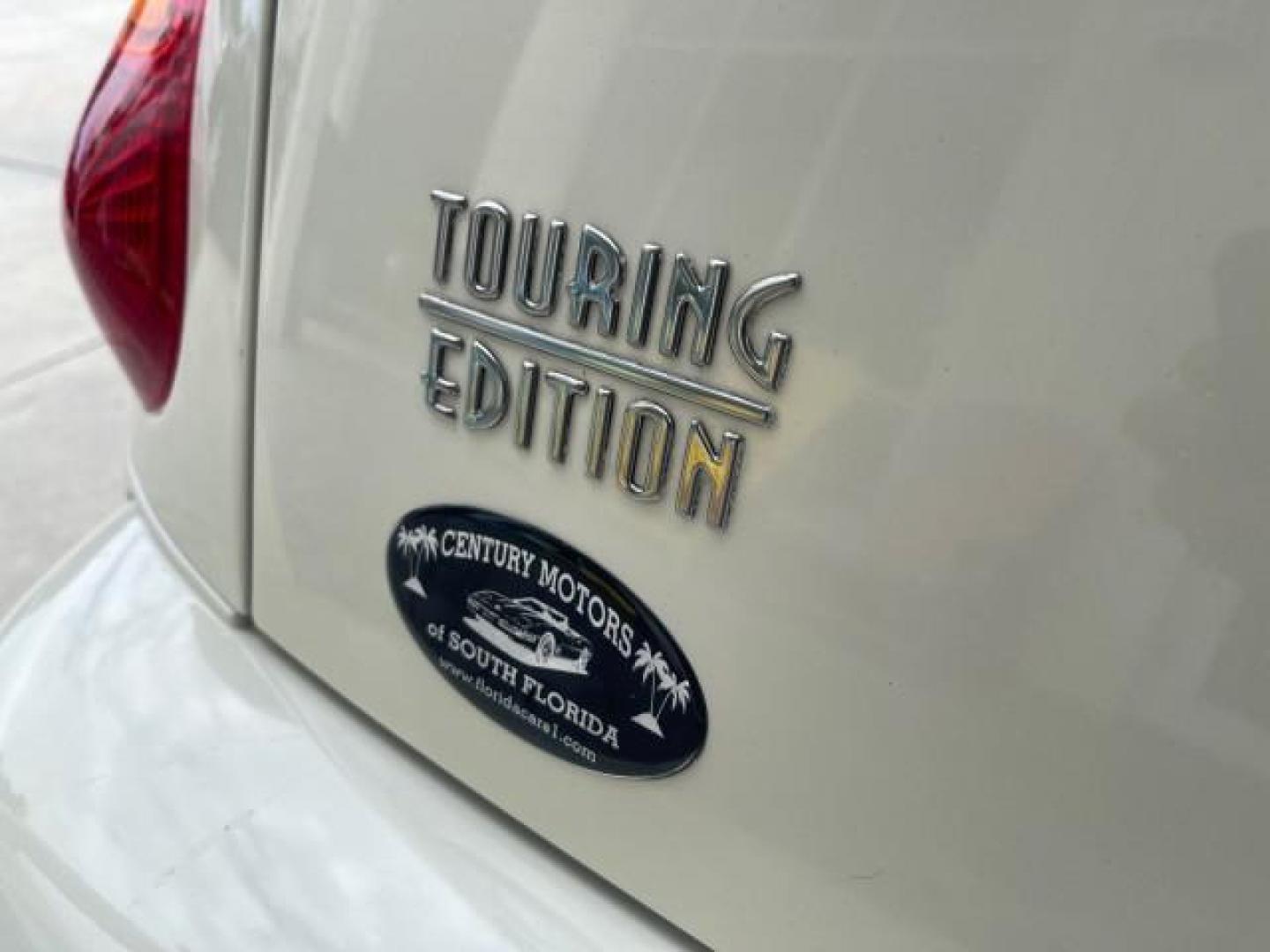 2004 Cool Vanilla /Dark Slate Gray Chrysler PT Cruiser Touring LOW MILES 46,180 (3C4FY58B34T) with an 2.4L 4-Cyl Engine engine, Automatic transmission, located at 4701 North Dixie Hwy, Pompano Beach, FL, 33064, (954) 422-2889, 26.240938, -80.123474 - OUR WEBPAGE FLORIDACARS1.COM HAS OVER 100 PHOTOS AND FREE CARFAX LINK 2004 CHRYSLER PT CRUISER TOURING EDITION VIN: 3C4FY58B34T209277 3 C 4 F Y 5 8 B 3 4 T 2 0 9 2 7 7 VAN 2.4L I4 F DOHC 16V GASOLINE 29 MPG FRONT WHEEL DRIVE Features Air Conditioning Alloy Wheels AM/FM Stereo Automatic Transmission - Photo#86