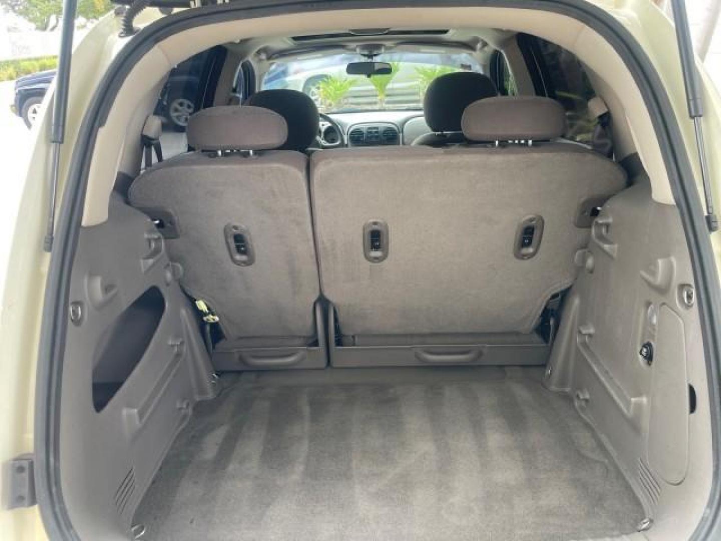 2004 Cool Vanilla /Dark Slate Gray Chrysler PT Cruiser Touring LOW MILES 46,180 (3C4FY58B34T) with an 2.4L 4-Cyl Engine engine, Automatic transmission, located at 4701 North Dixie Hwy, Pompano Beach, FL, 33064, (954) 422-2889, 26.240938, -80.123474 - OUR WEBPAGE FLORIDACARS1.COM HAS OVER 100 PHOTOS AND FREE CARFAX LINK 2004 CHRYSLER PT CRUISER TOURING EDITION VIN: 3C4FY58B34T209277 3 C 4 F Y 5 8 B 3 4 T 2 0 9 2 7 7 VAN 2.4L I4 F DOHC 16V GASOLINE 29 MPG FRONT WHEEL DRIVE Features Air Conditioning Alloy Wheels AM/FM Stereo Automatic Transmission - Photo#90